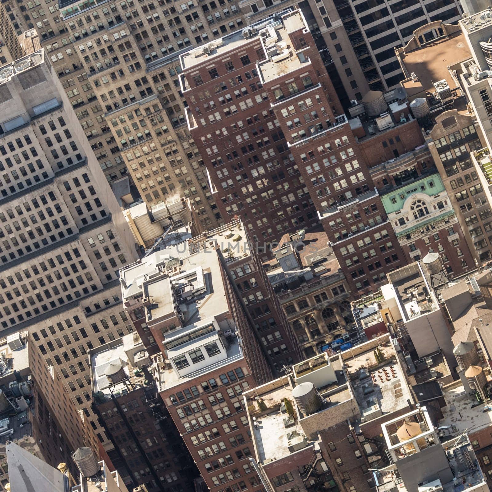 New York City, USA. Midtown Manhattan building rooftops with steam comming from the heating systems.