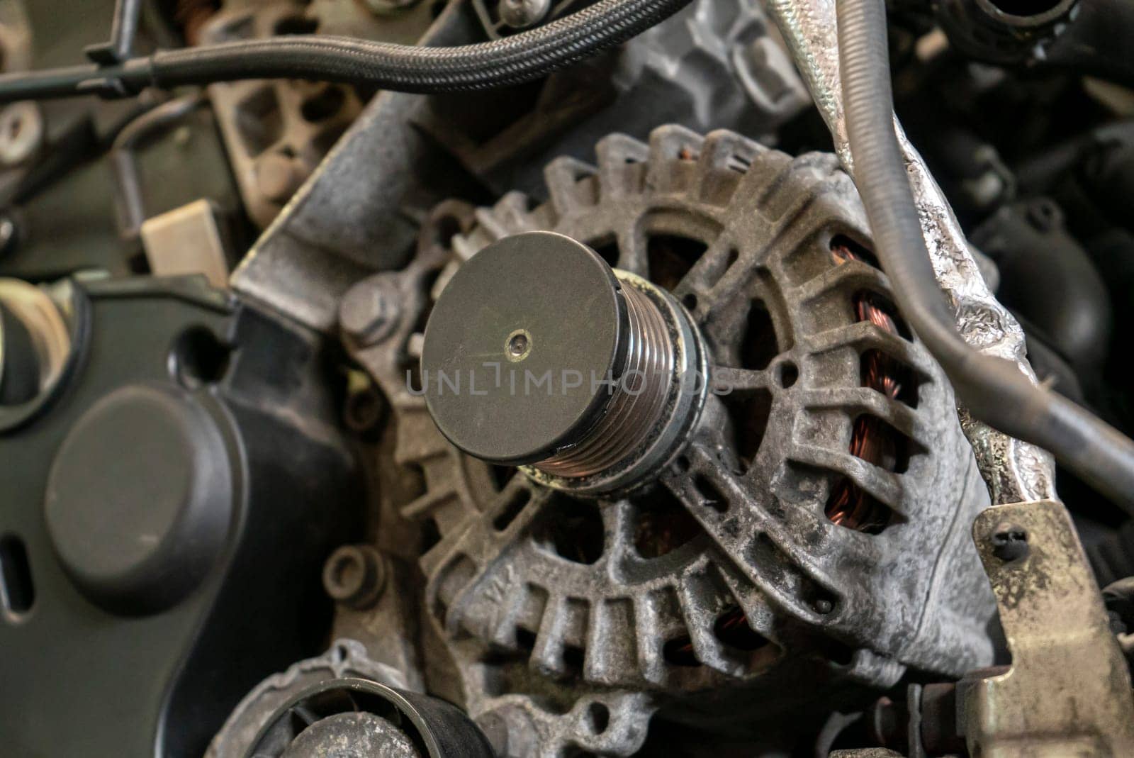 Alternator car engine detail in a workshop