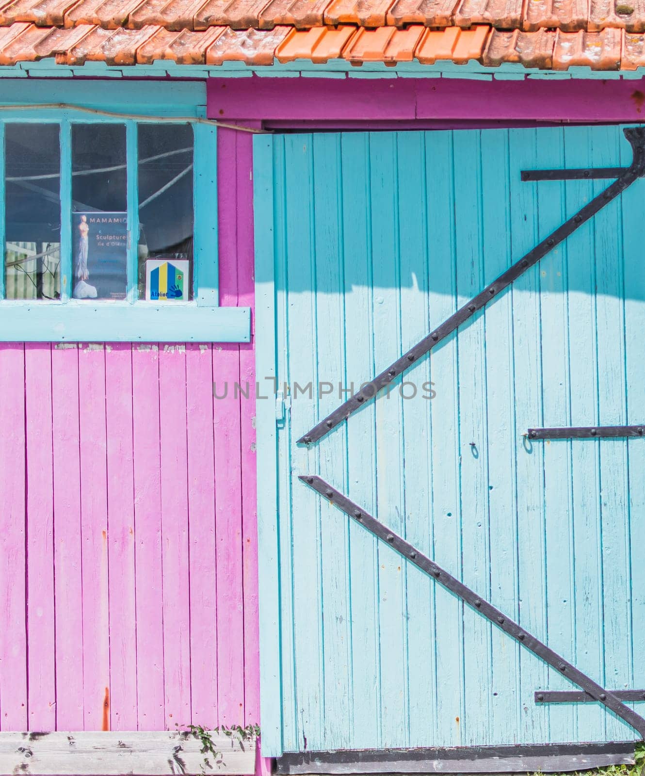 Colorful cabins on the harbor of Château d'Oléron, on the island of Oléron in France