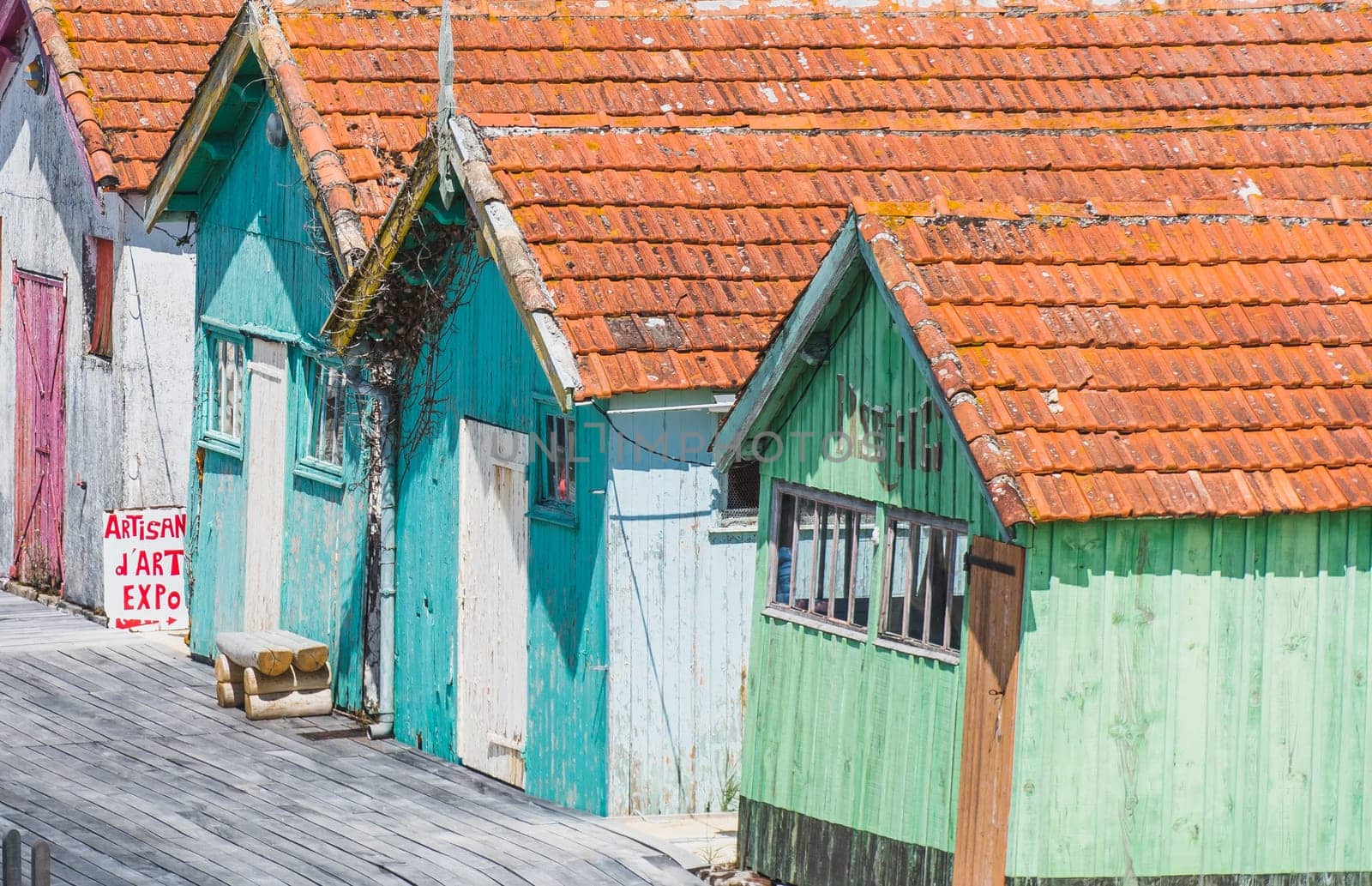 Colorful cabins on the harbor of Château d'Oléron, on the island of Oléron in France