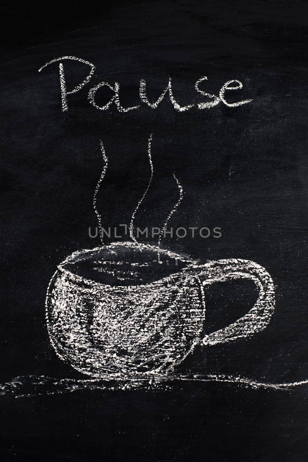 Chalk drawing of a cup of coffee on a blackboard, taking a break