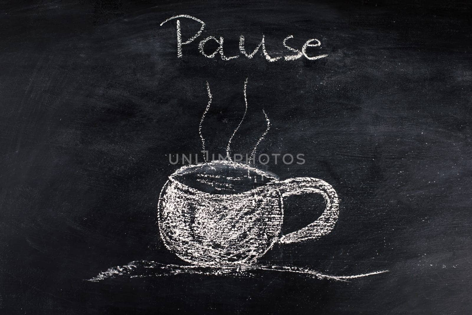Chalk drawing of a cup of coffee on a blackboard, taking a break