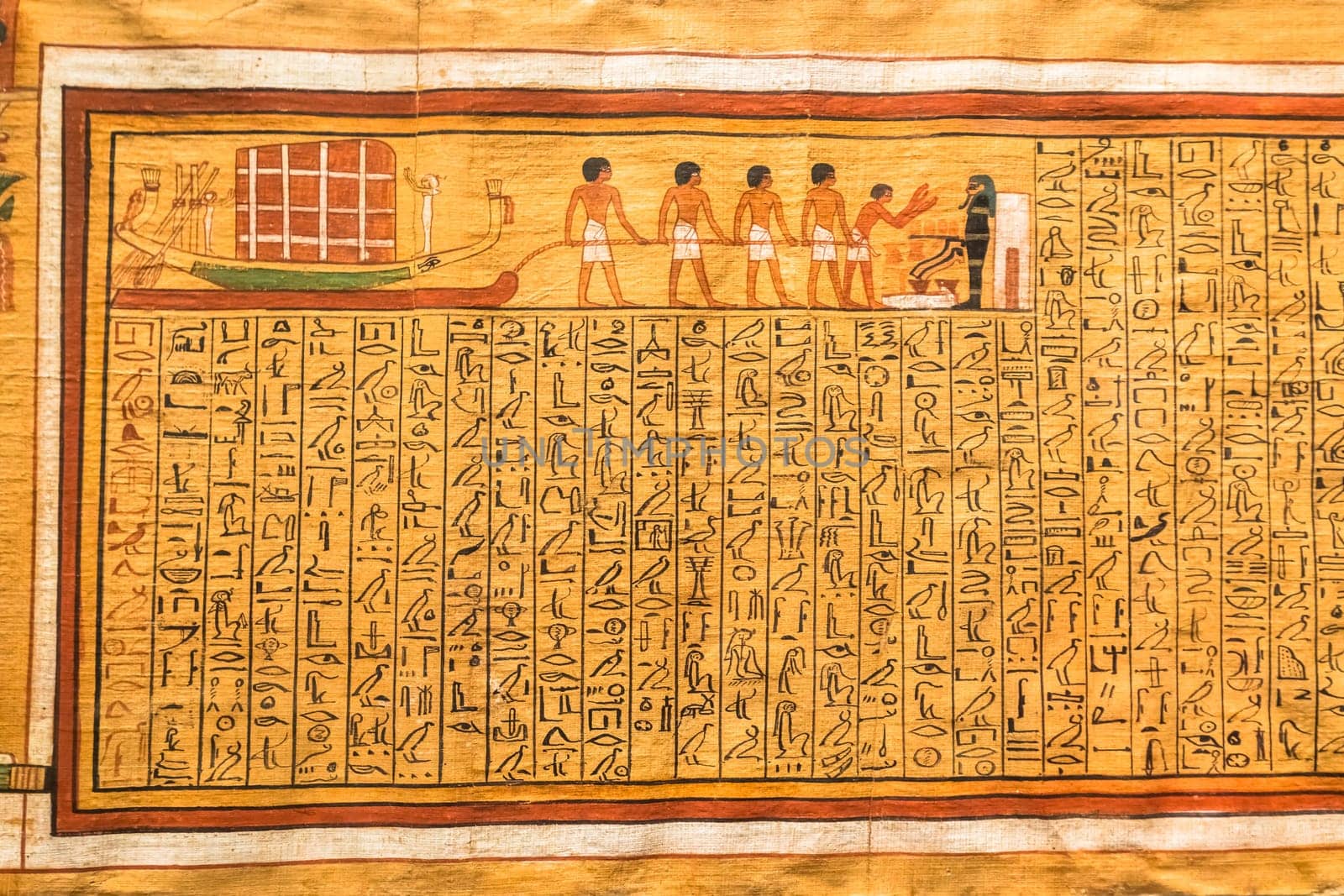 TURIN, ITALY - CIRCA MAY 2021: ancient Egyptian papyrus with hieroglyphic funerary text. Circa 1550 BC antique manuscript.