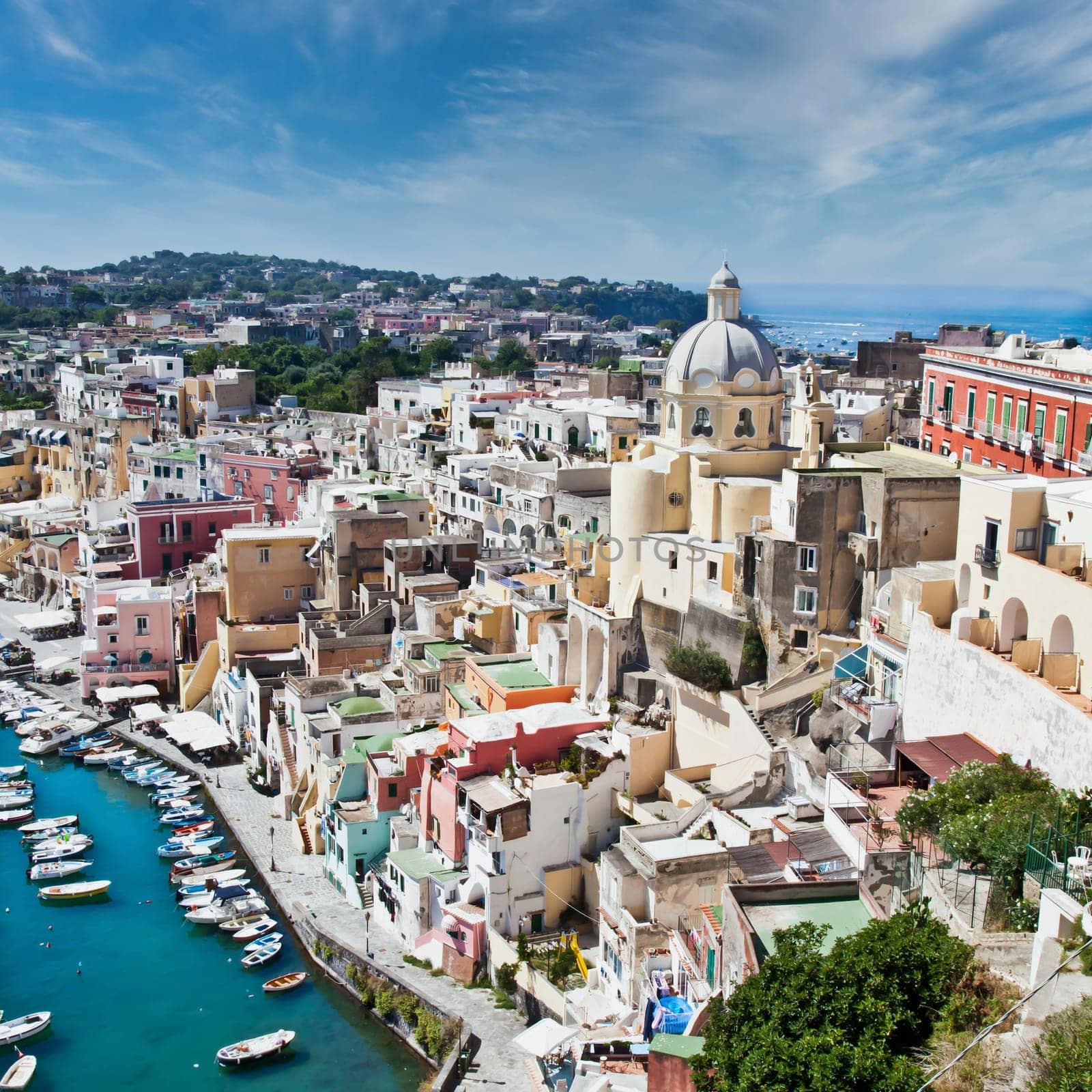 PROCIDA, ITALY - CIRCA AUGUST 2020: panoramic view of the mediterranean Italian island close to Naples in a summer day.