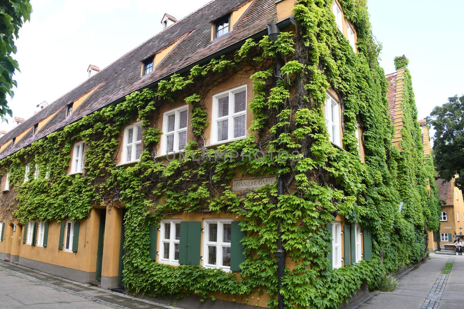 The Fuggerei in Augsburg was donated by Jakob Fugger in 1521. The row house settlement is the oldest existing social housing estate in the world. She celebrated her 500th birthday in 2021