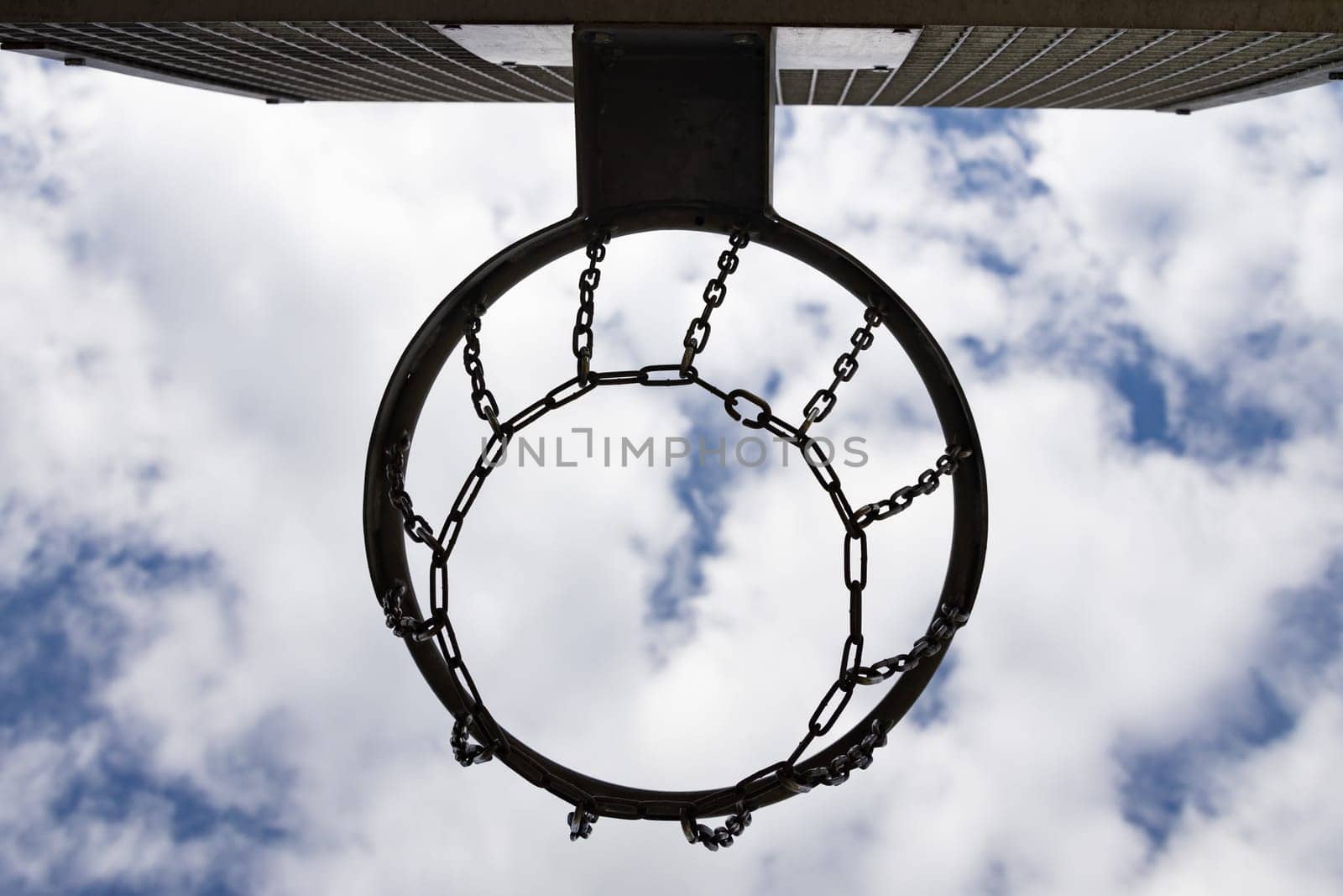 Weathered Basketball Hoop on a sunny day in summertime