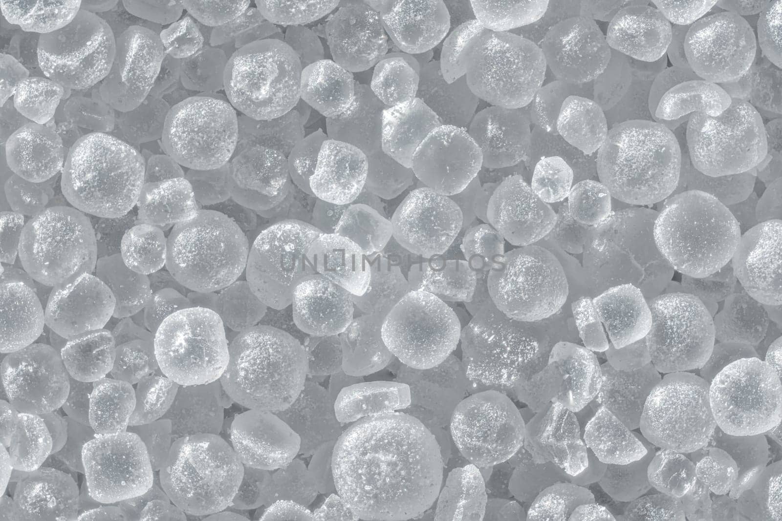 White table salt crystals under microscope, image width 9mm, abstract science background.