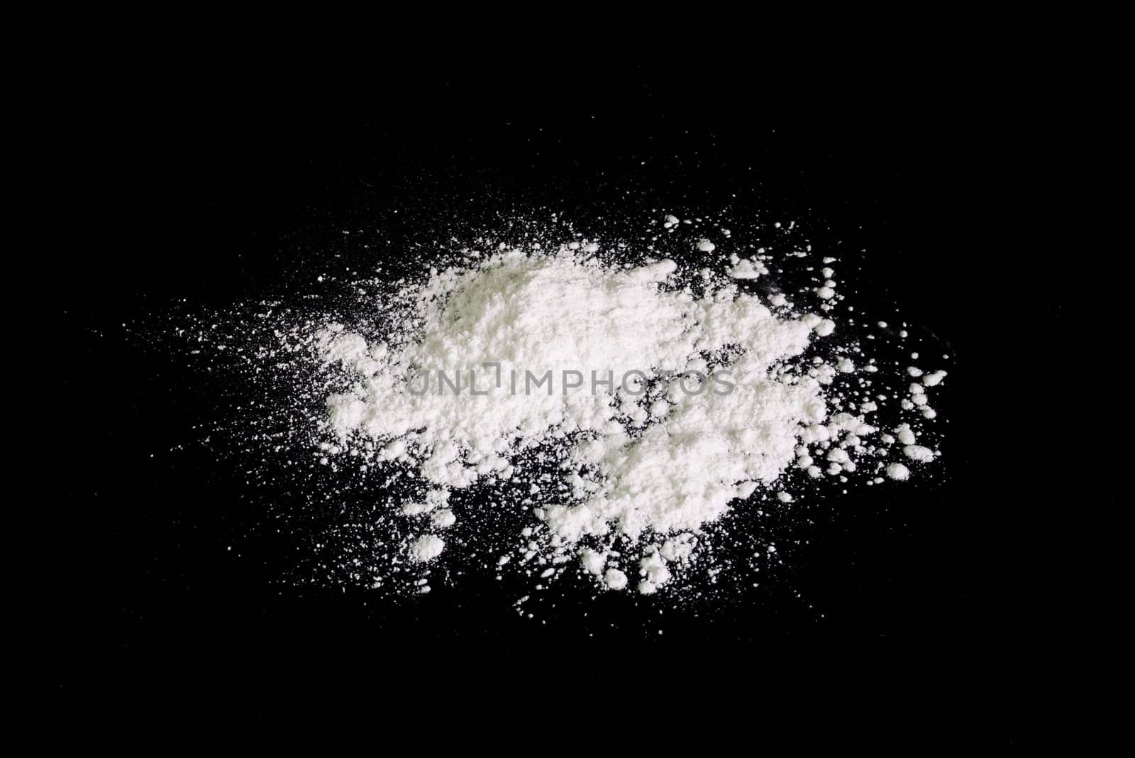Baby talcum powder on black background