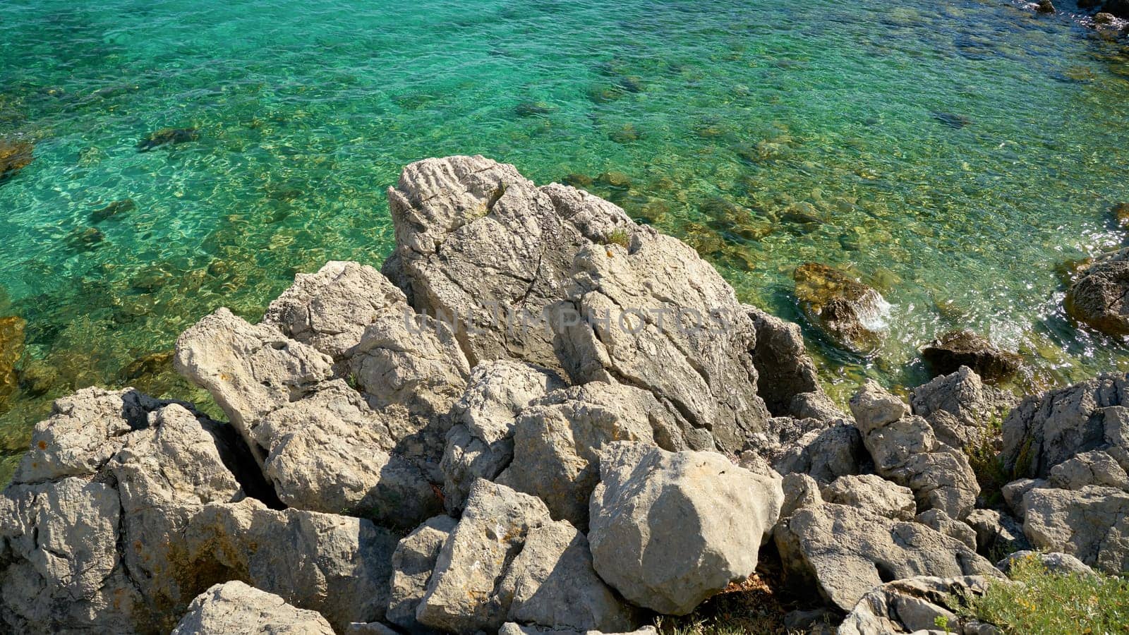Rocky coast of the Adriatic Sea on the island of Krk near the town of the same name Krk in Croatia