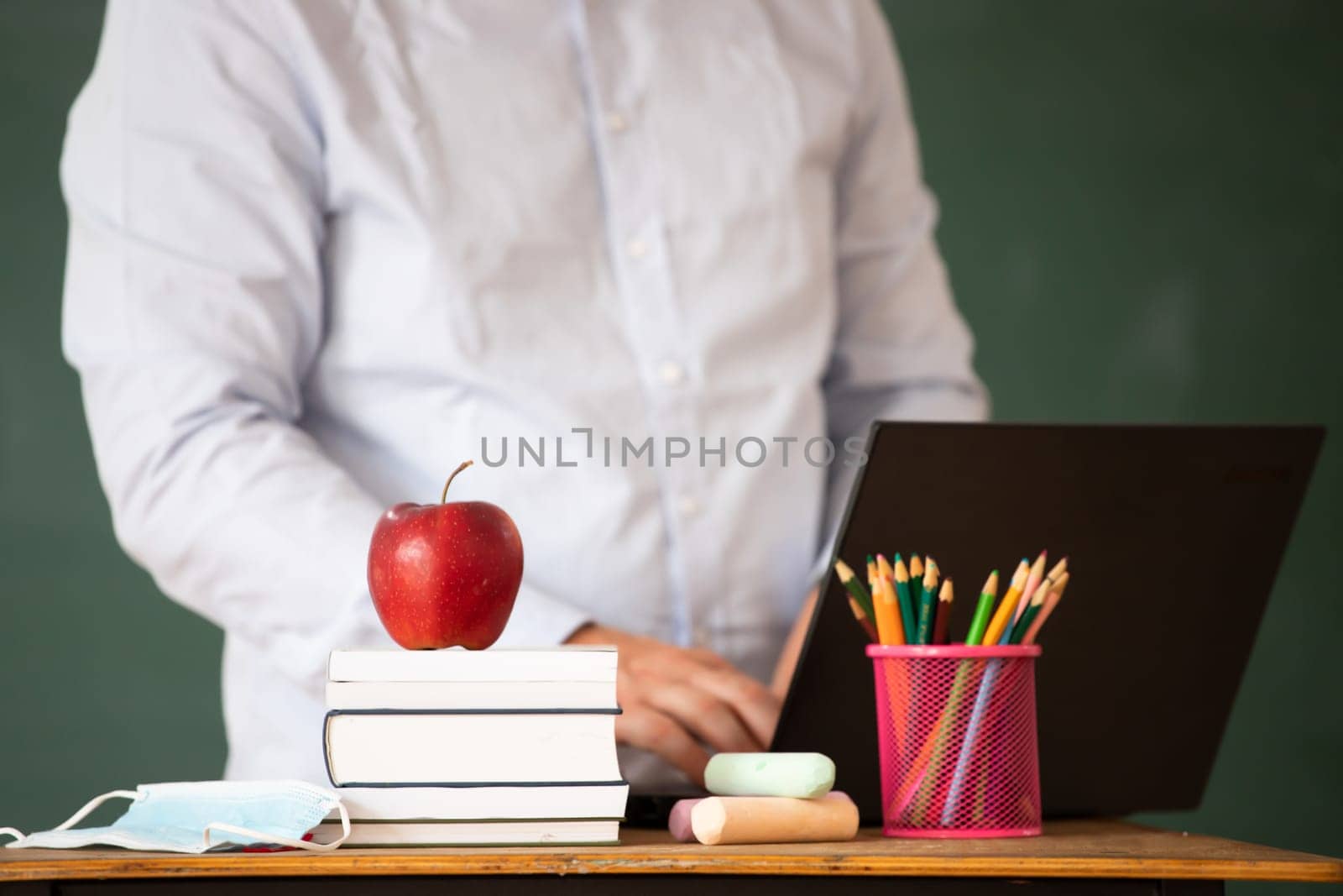Back to School Concept. School math teacher giving virtual teaching remote class online lesson by zoom conference call on laptop computer.
