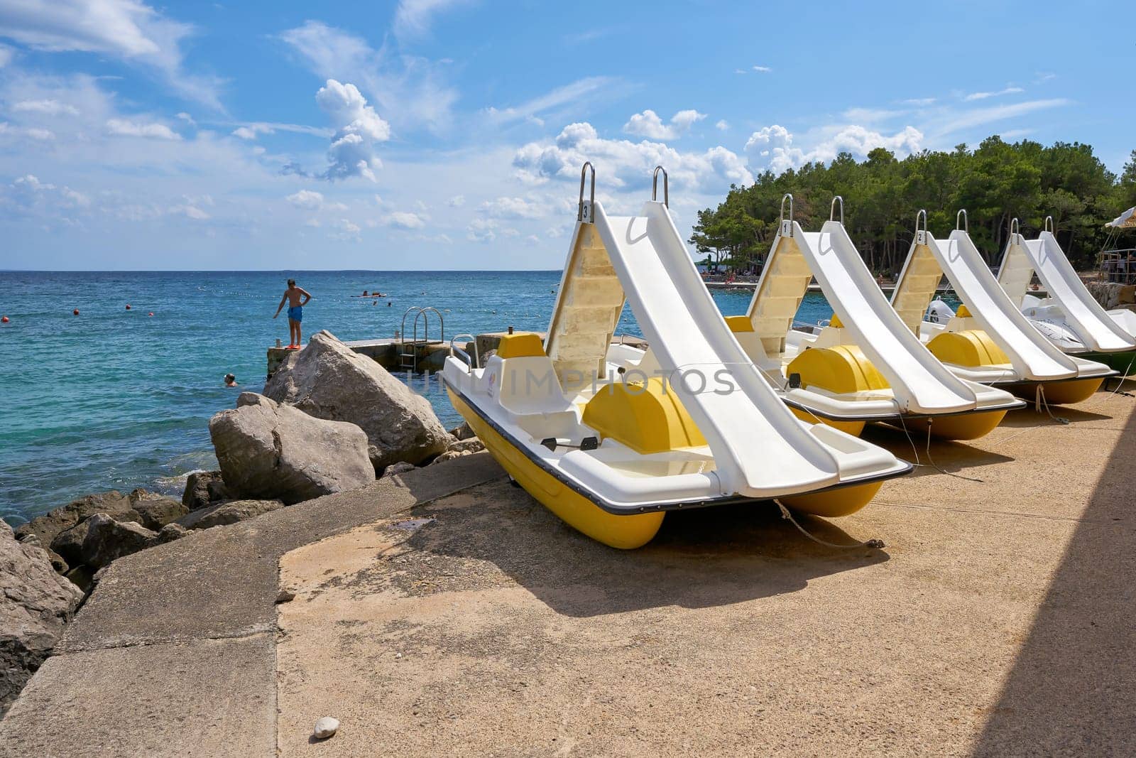 Pedal boats on the beach near the town of Krk on the Adriatic Sea in Croatia