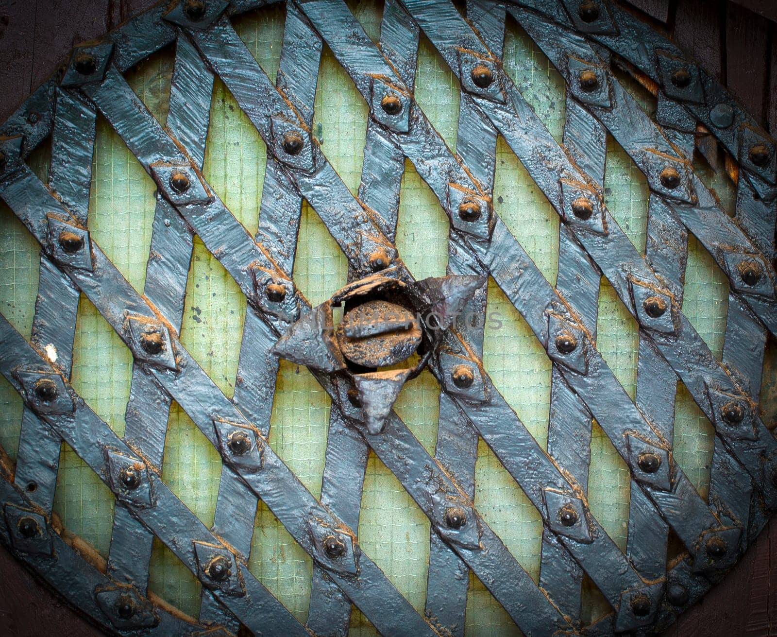 The Texture of old mesh dirty metal. Selective focus