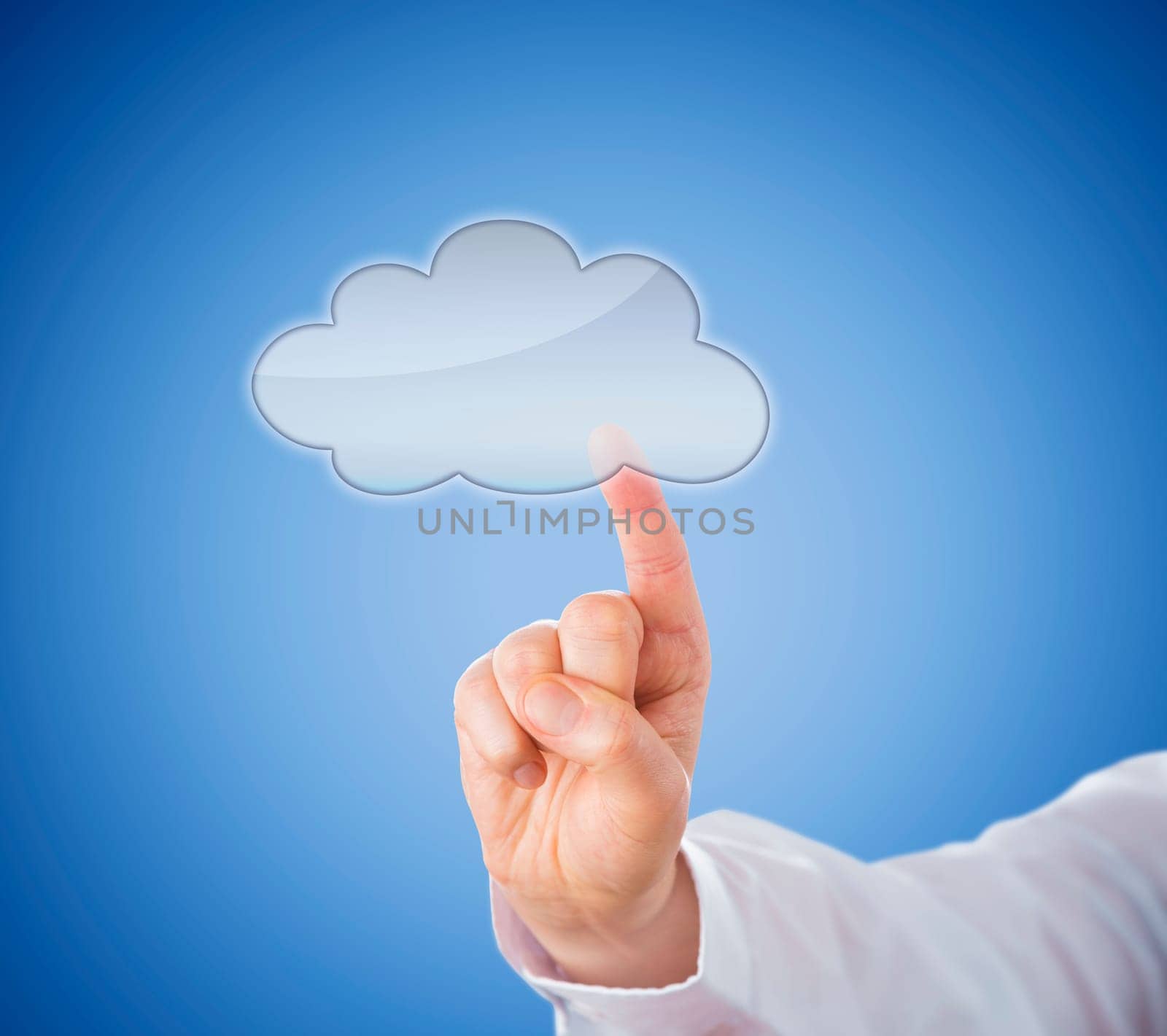 Copy space in transparent cloud computing icon which is being activated by touch. Hand in close up stretching its index finger to reach the cloud button. Light blue background. Technology metaphor.