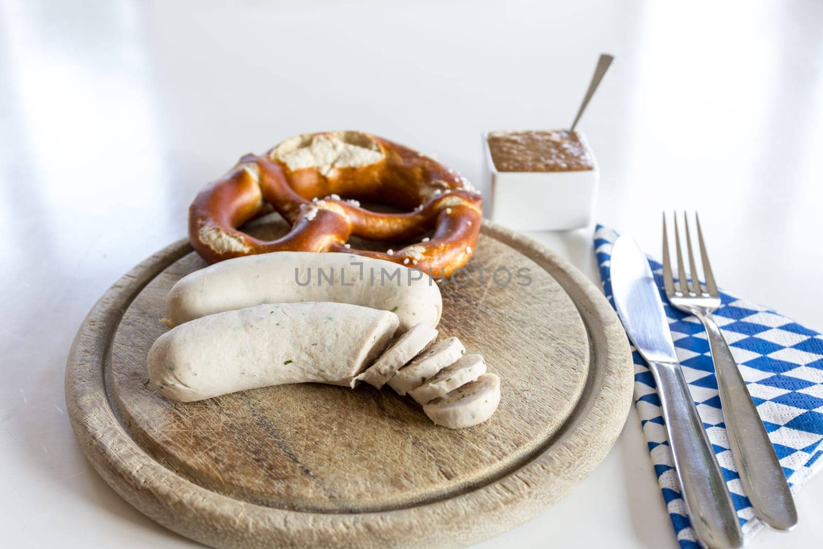 A snack - white sausage and pretzel