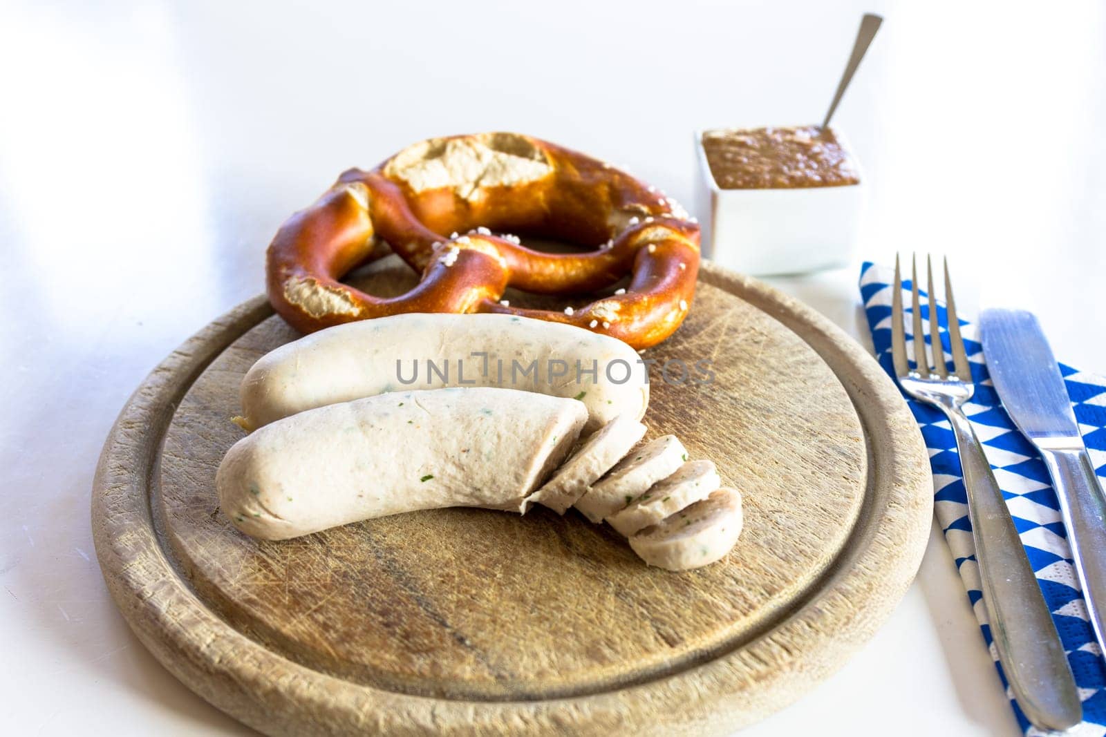 A snack - white sausage and pretzel