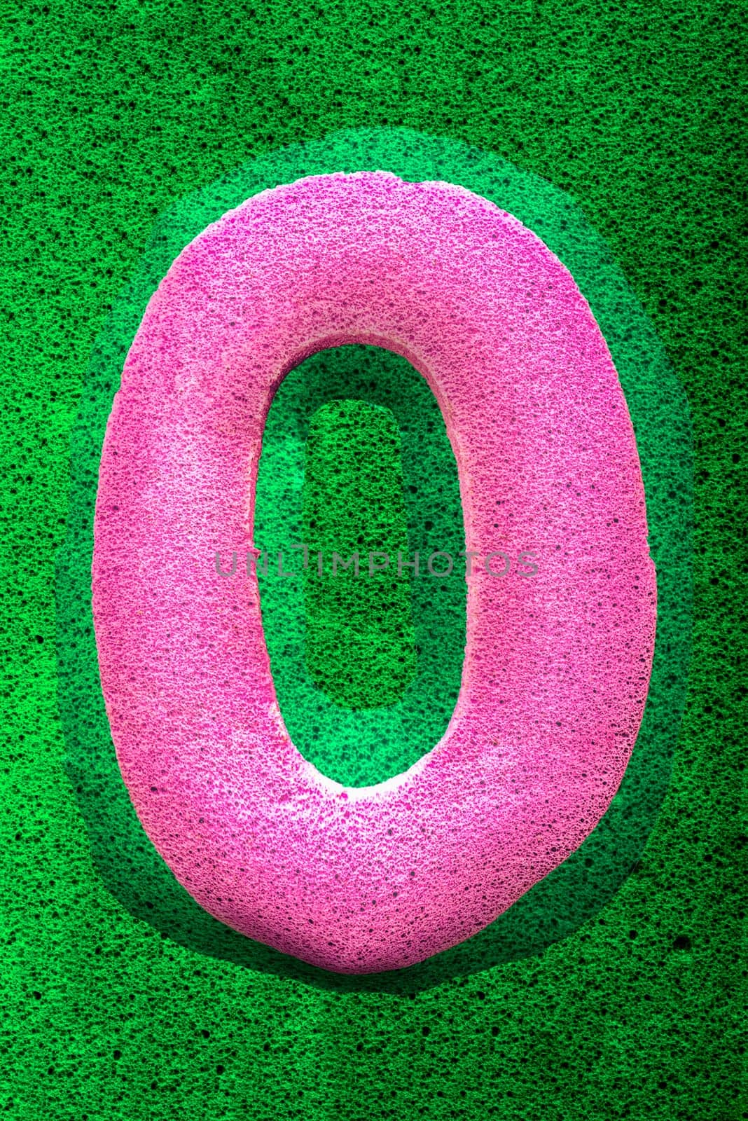 The number zero in a pink sponge like texture, raised 3D from the green background.