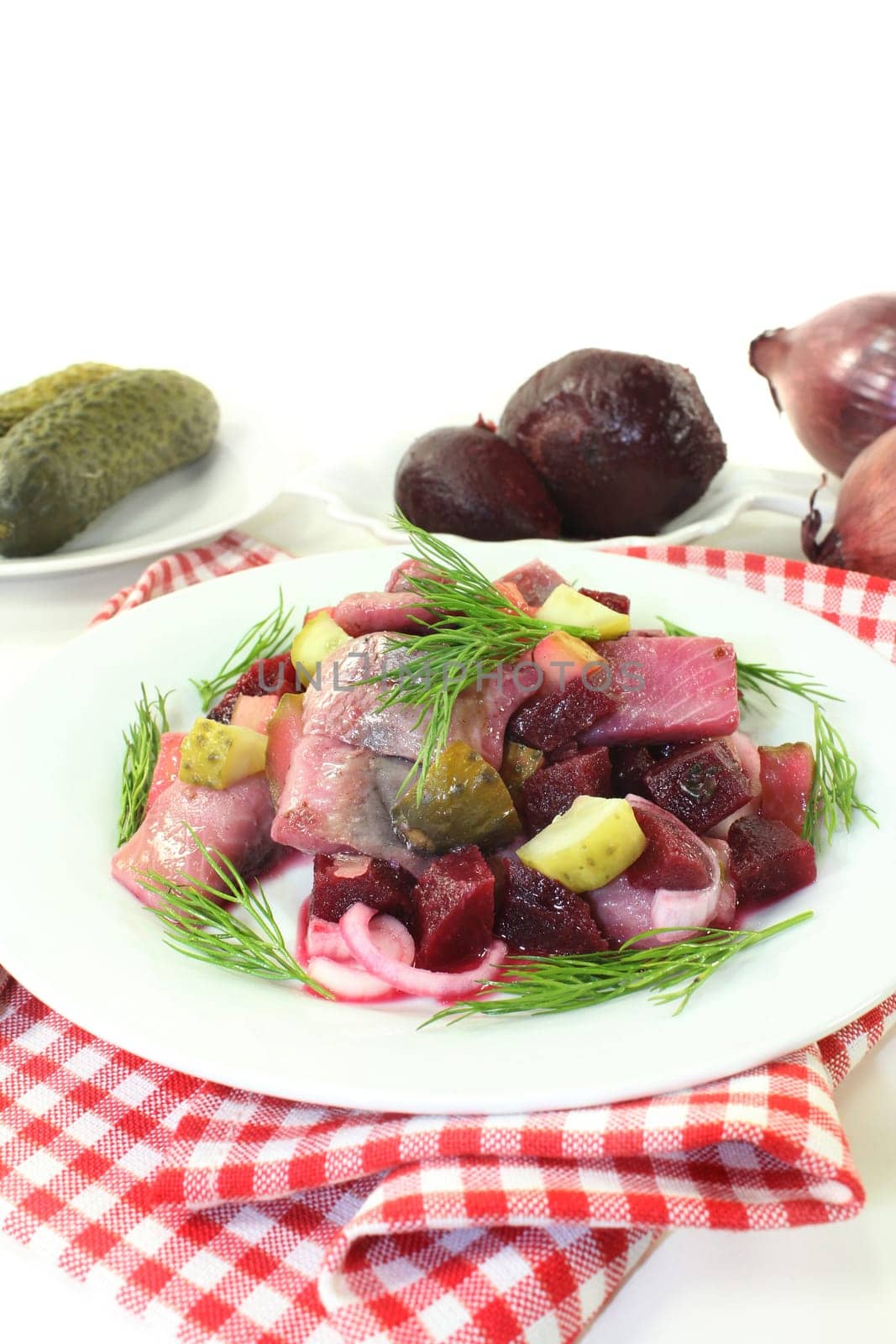 Matjessalat with beetroot,onions and sour cucumber