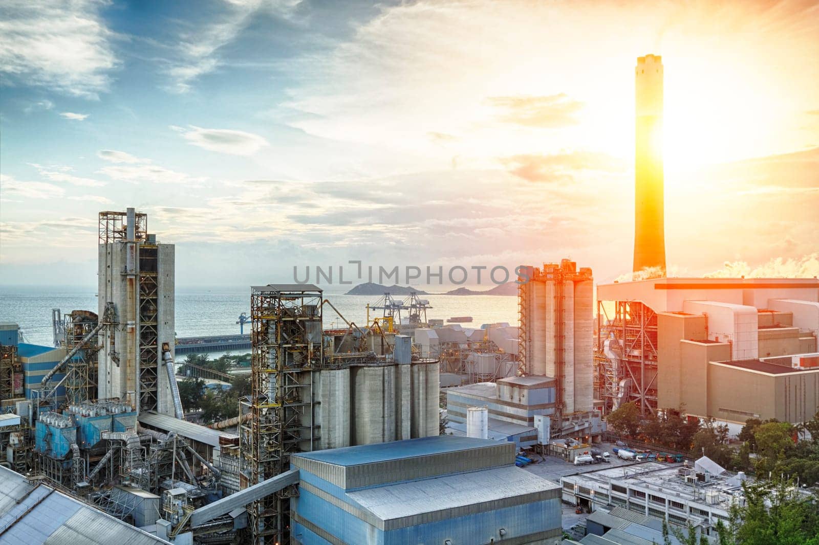 Glow light of petrochemical industry on sunset.