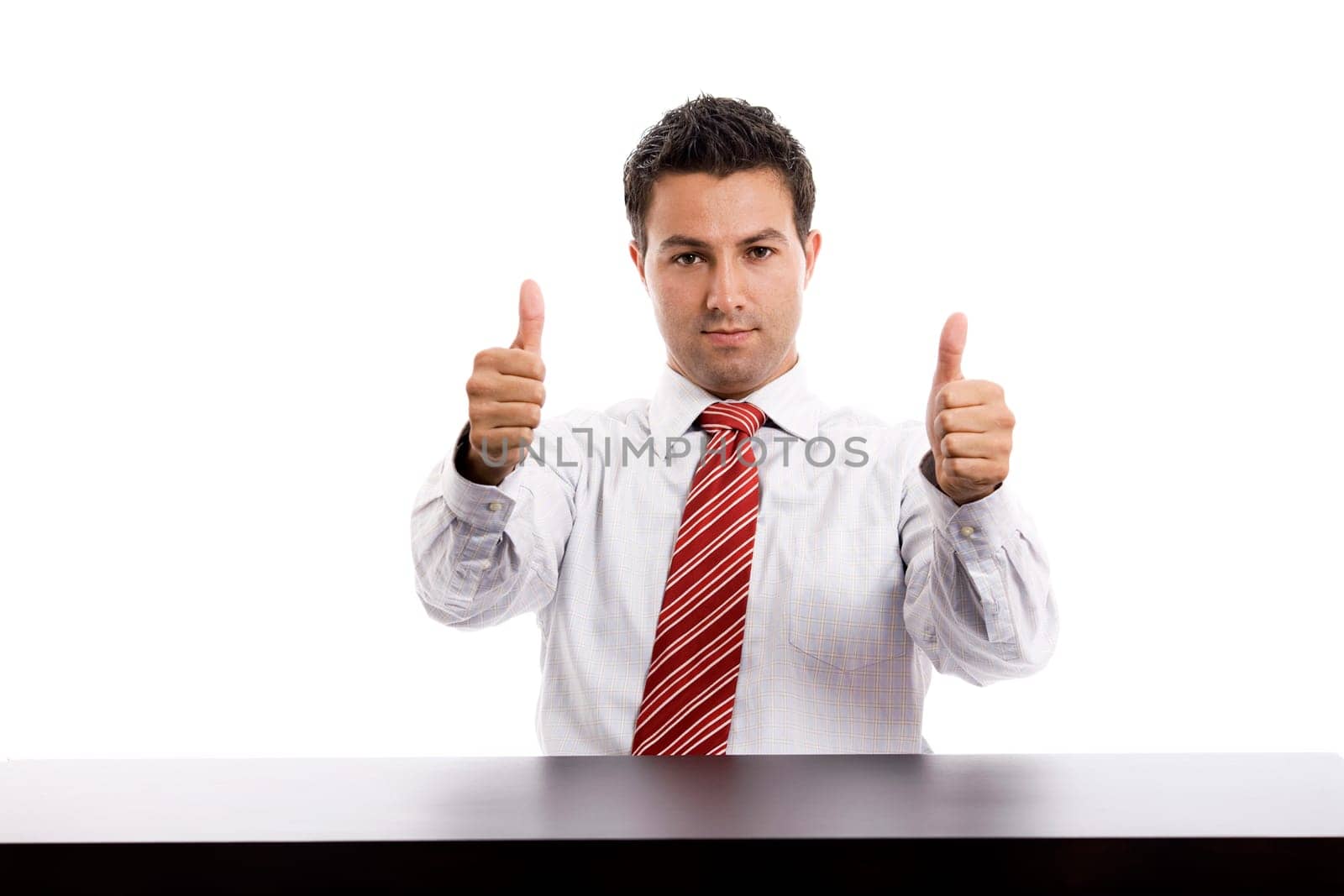 young business man on a desk, isolated on white