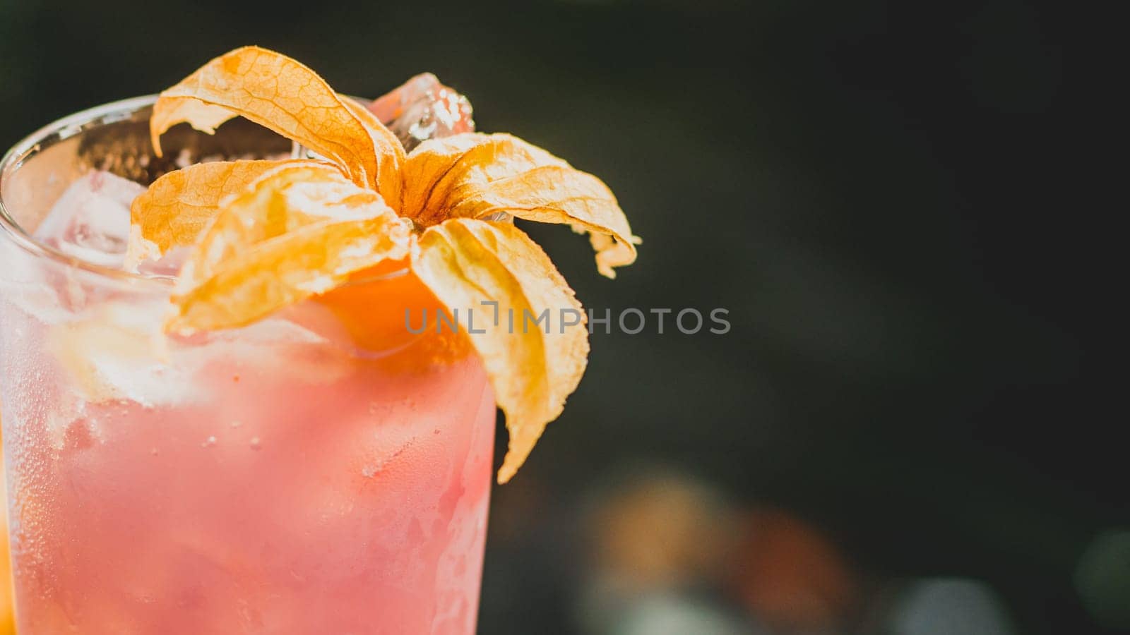 Fresh summer soft drink lady mocktail pour in glass decoration with flower