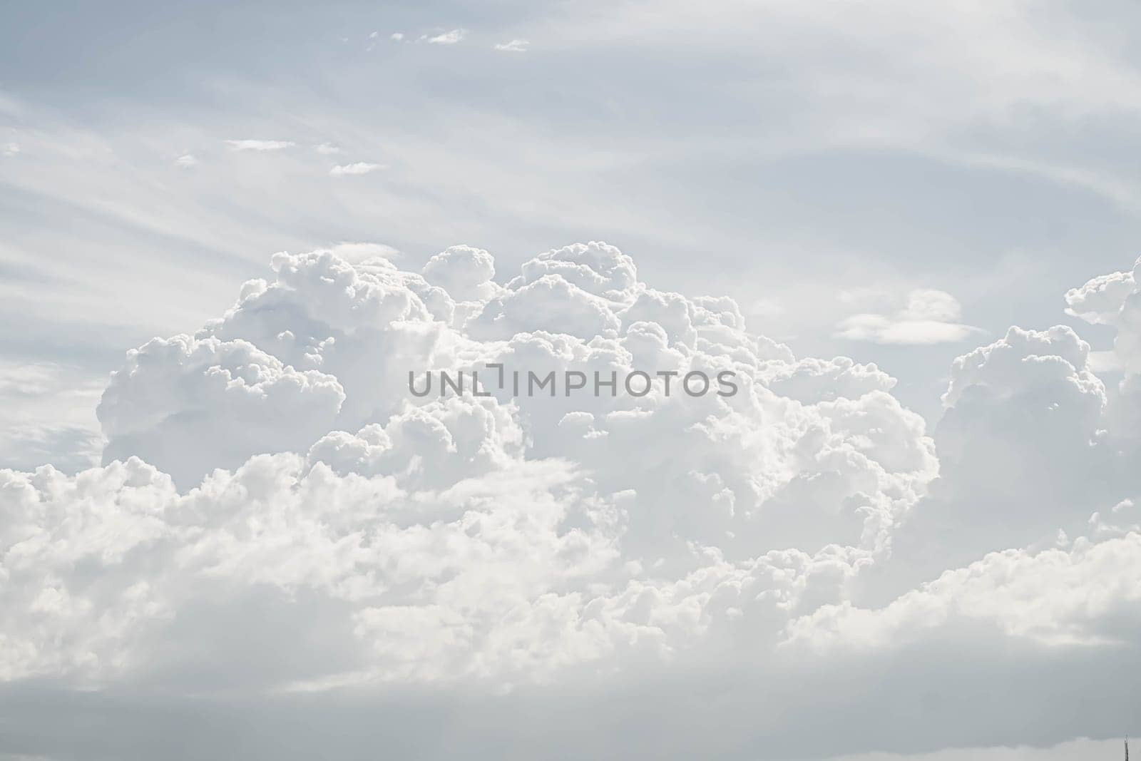 Beautiful white fluffy clouds sky background with blue sky background for copy space