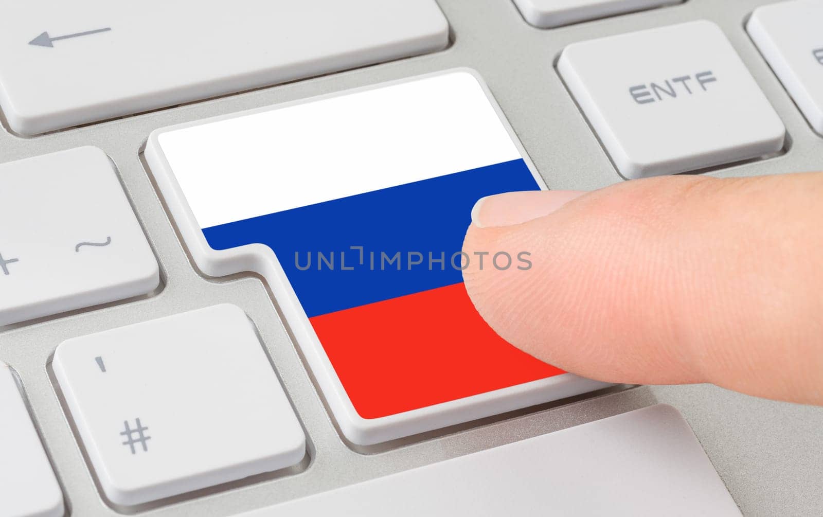 A keyboard with a labeled button - Flag of Russia