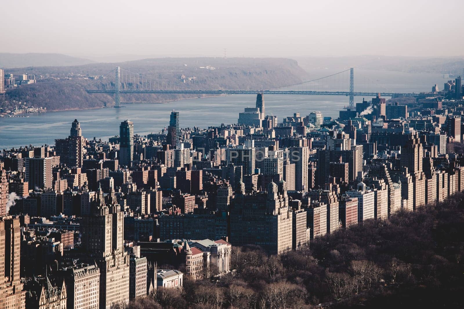 Panoramic elevated view of Central Park, Upper West Side and the George Washington Bridge with Hudson River in Fall. Manhattan, New York City, USA