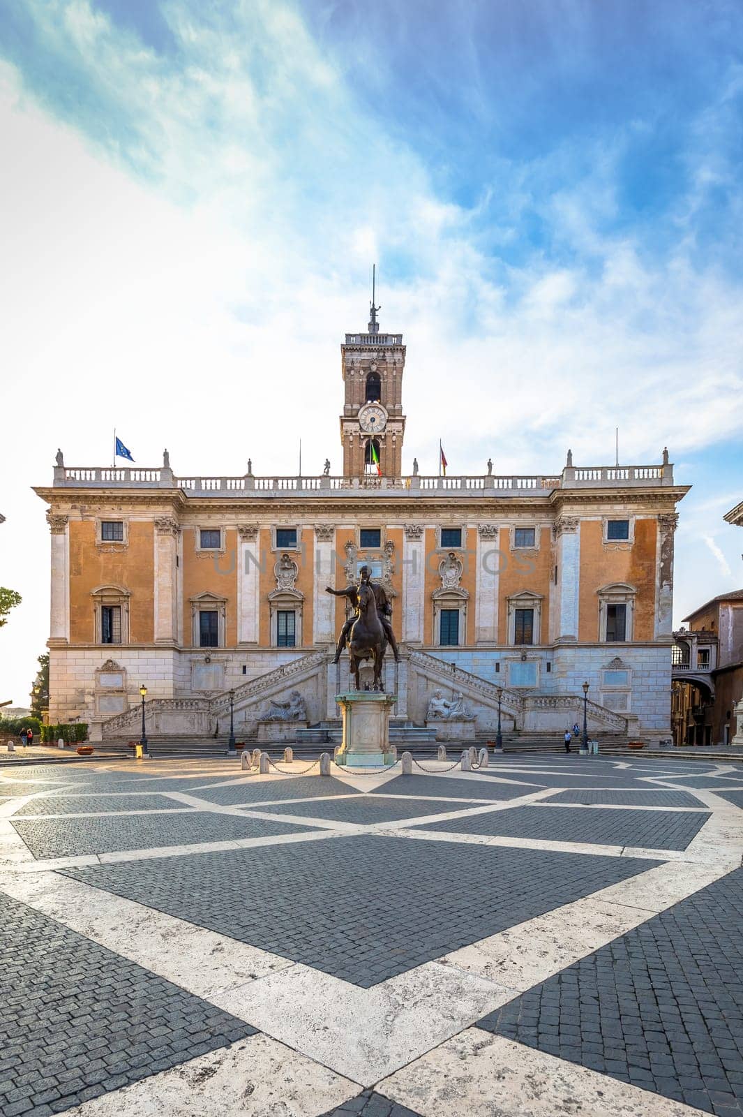 ROME, ITALY - CIRCA AUGUST 2020: Capitolium Square (Piazza del Campidoglio). Made by Michelangelo, it is home of Rome (Roma) City Hall. Sunrise light, before turist arrival.