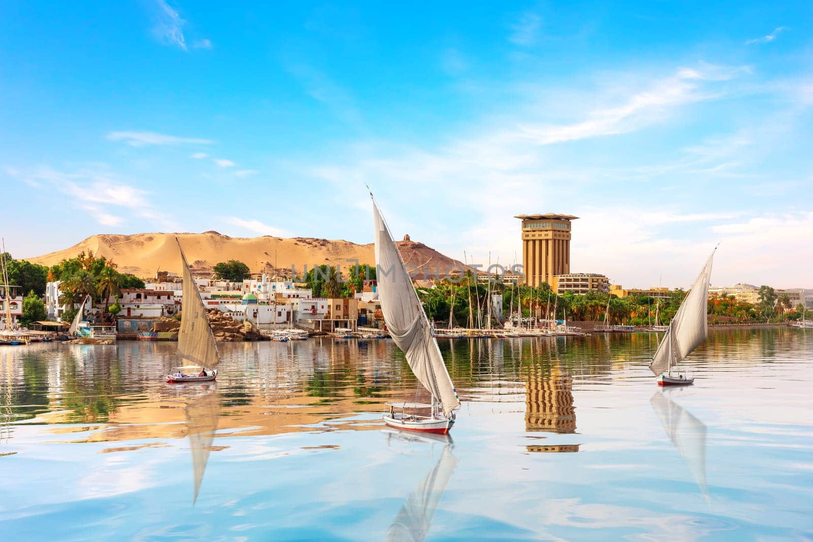 The Nile and sailboats in Aswan, Egypt, summer scenery.