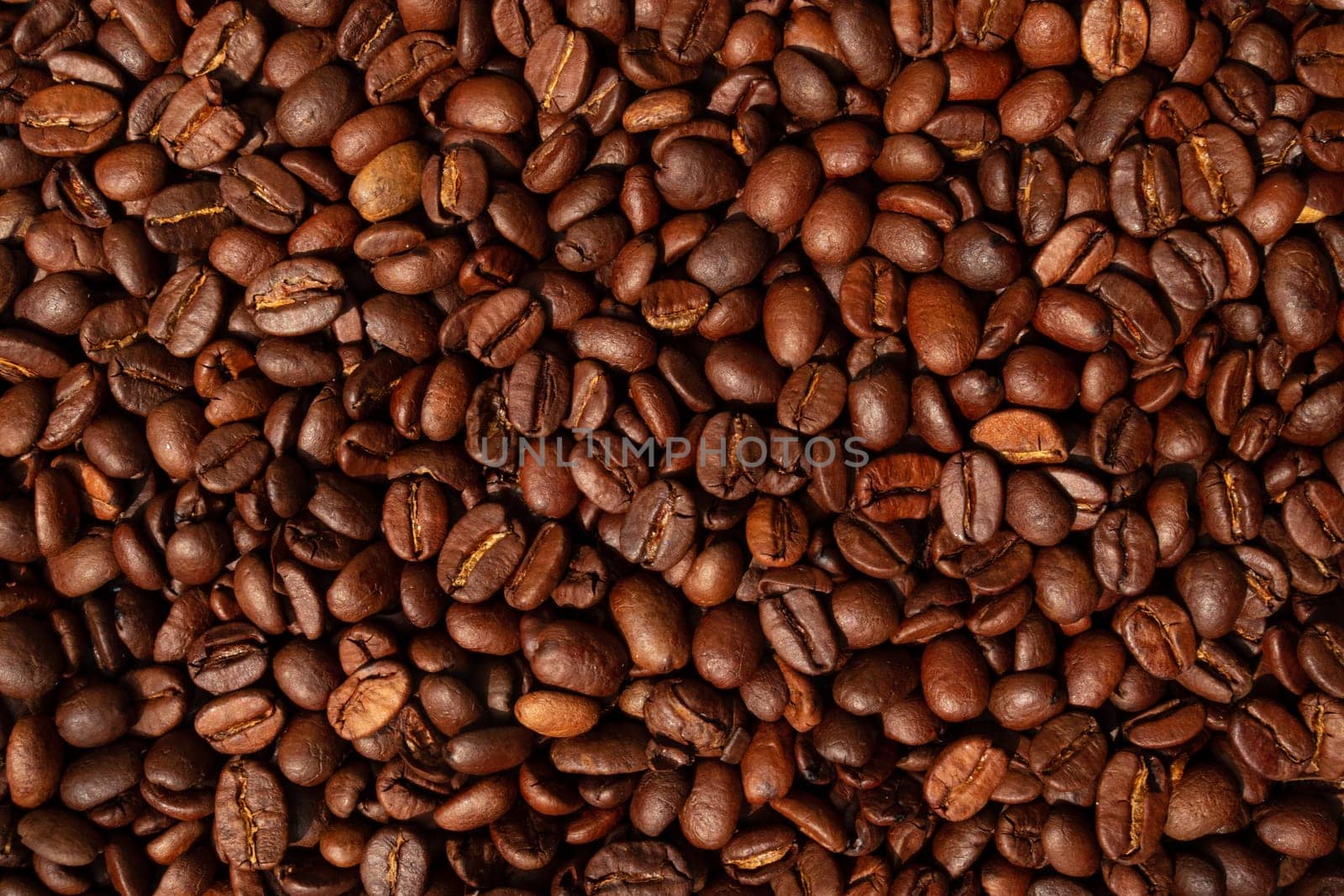 Roasted brown coffee beans,  top view background