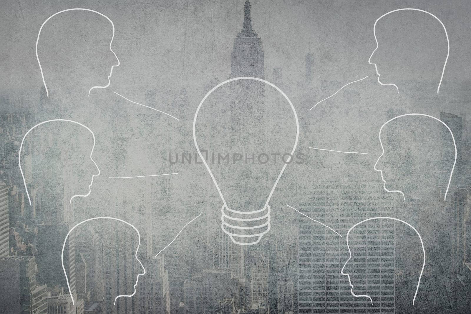 Silhouettes of faces connecting to a light bulb, teamwork, online meeting, communication, city in a blurry background