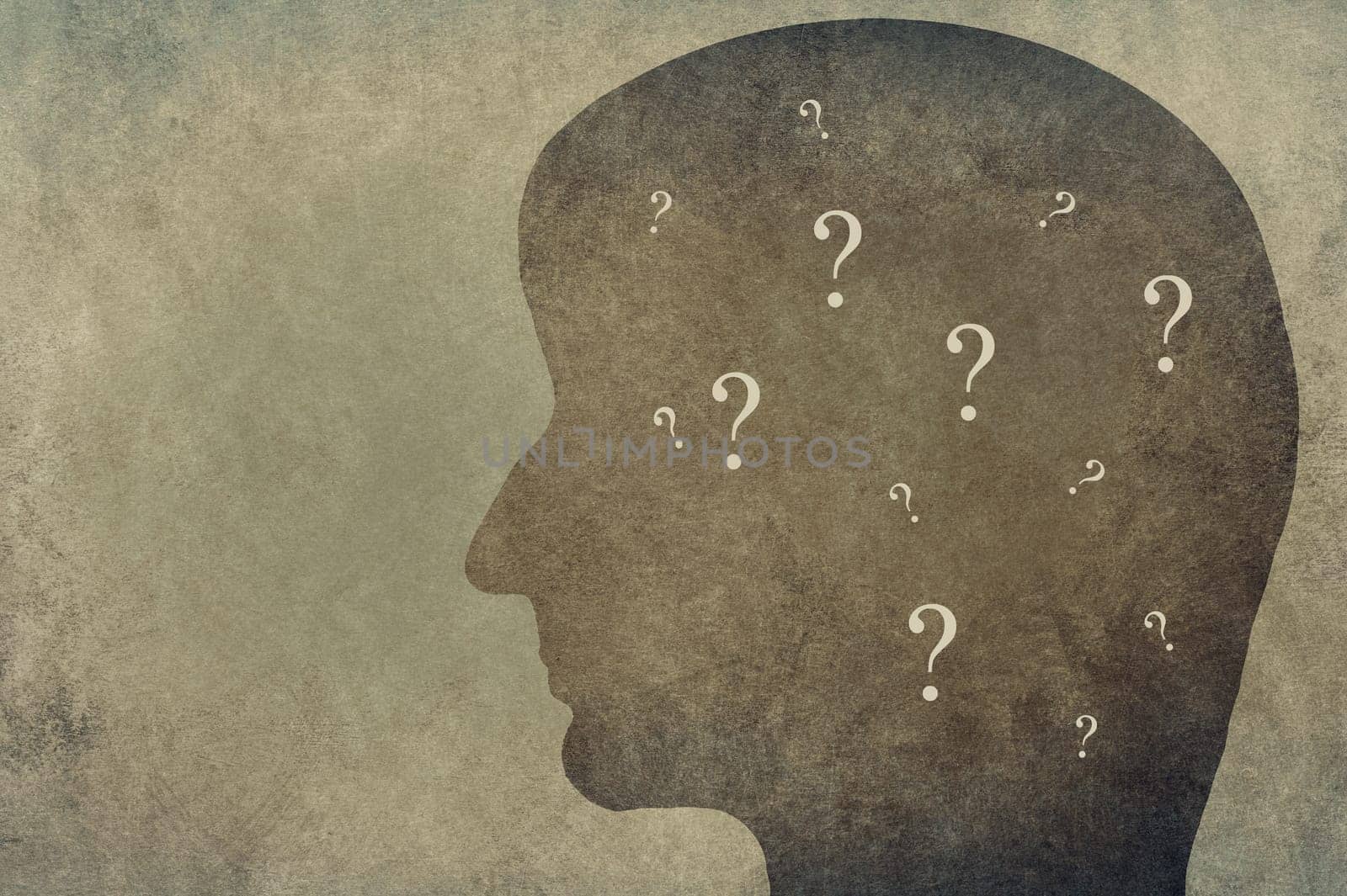 Silhouette of a head with question marks, empty copy space