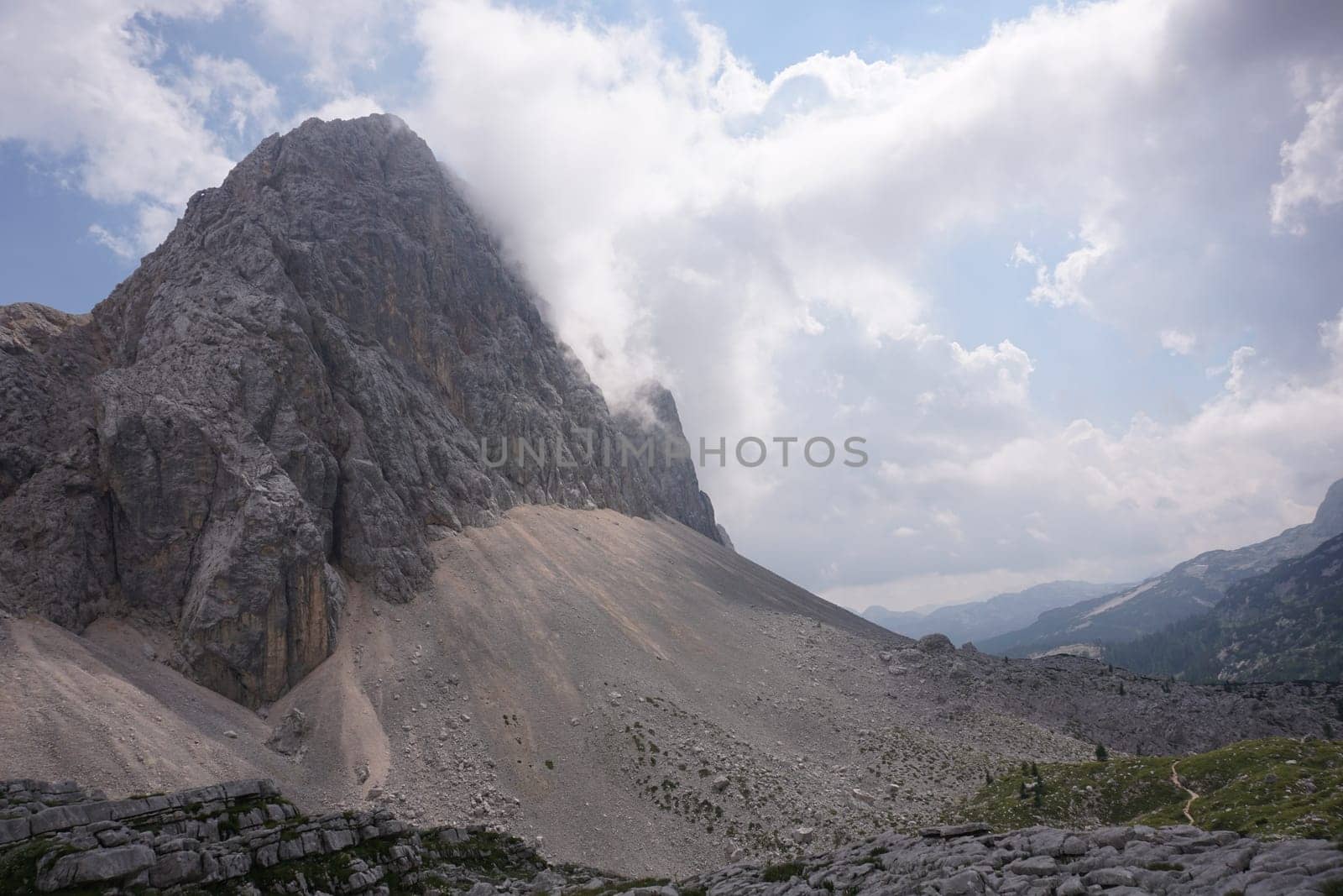 Mountain peak half covered by clouds on the Seven Lakes Valley hike, Slovenia 2020