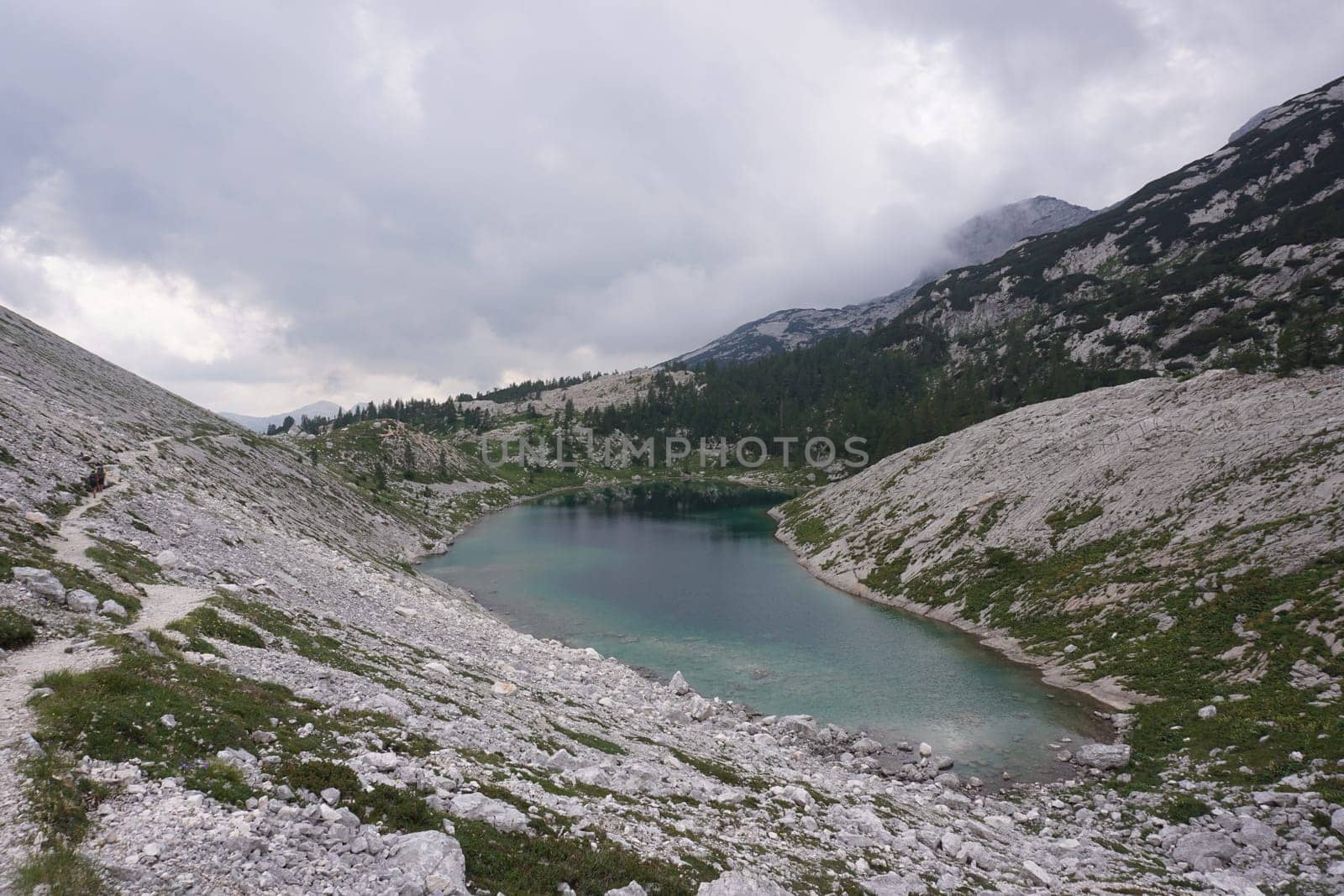 Winding path along one of the lakes on the Seven Lakes Valley hike, Slovenia 2020