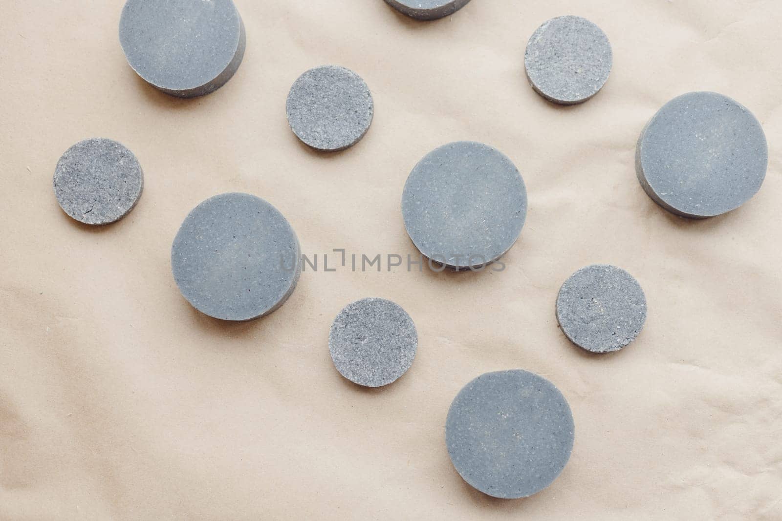 Eco friendly natural solid shampoo and hair conditioner on paper background. Concept animal fat free, zero waste cosmetics