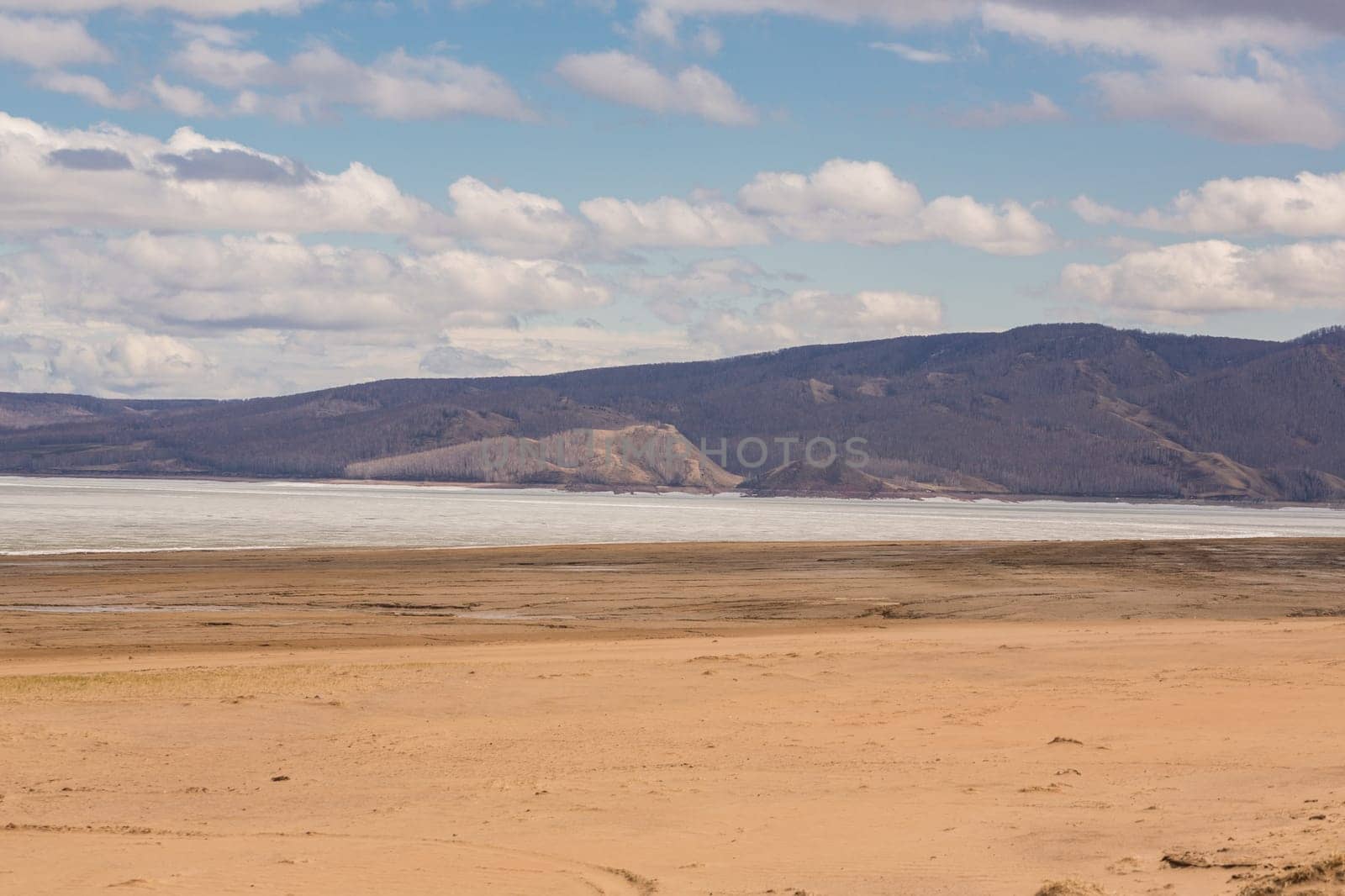 A sandy beach on the bank of the Yenisei River.Republic of Khakassia