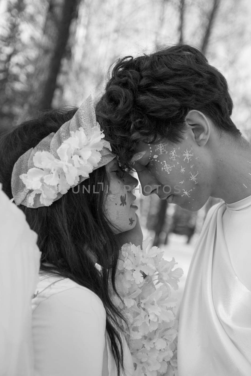 Fine art imagery. Woman and angel man embracing