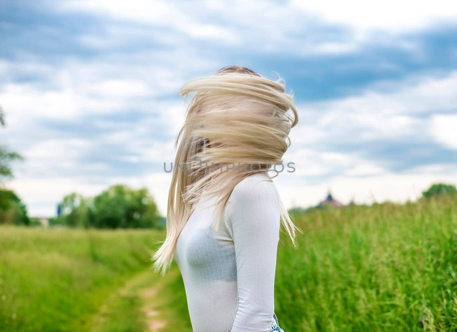young woman with tousled hair