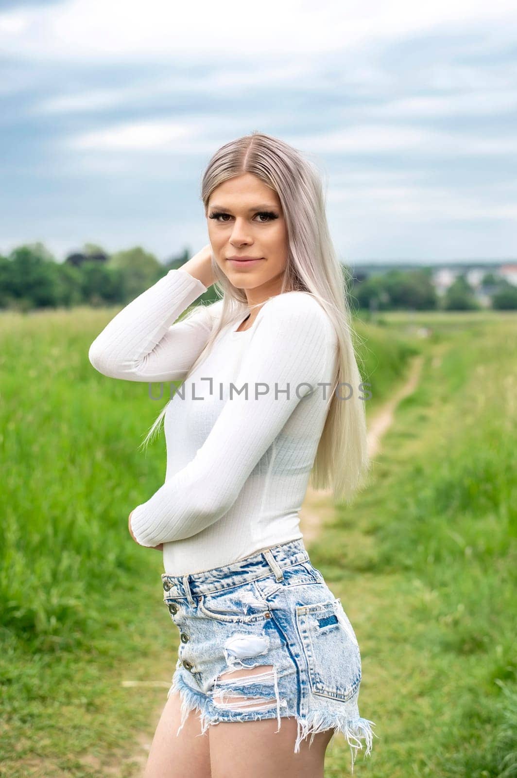 sensual young woman on a meadow