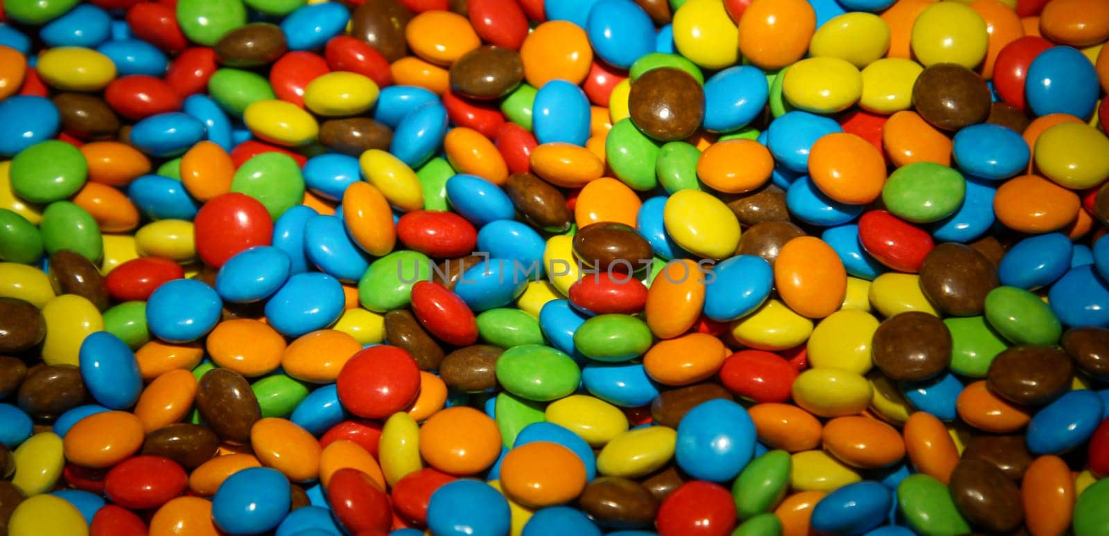 Sweet temptation made from lots of colorful chocolate buttons.