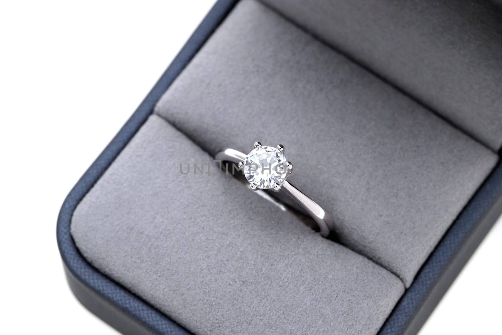 Close up of elegant diamond ring in the box, Love and wedding concept