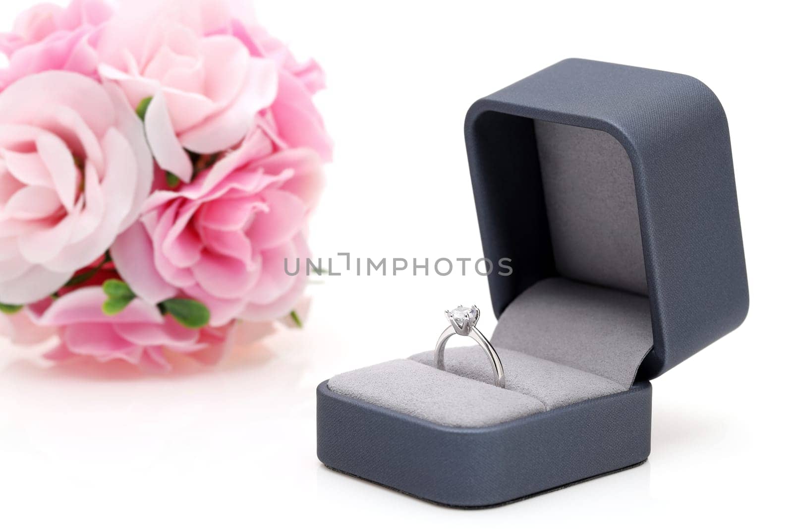 Close up of elegant diamond ring in the box, Love and wedding concept