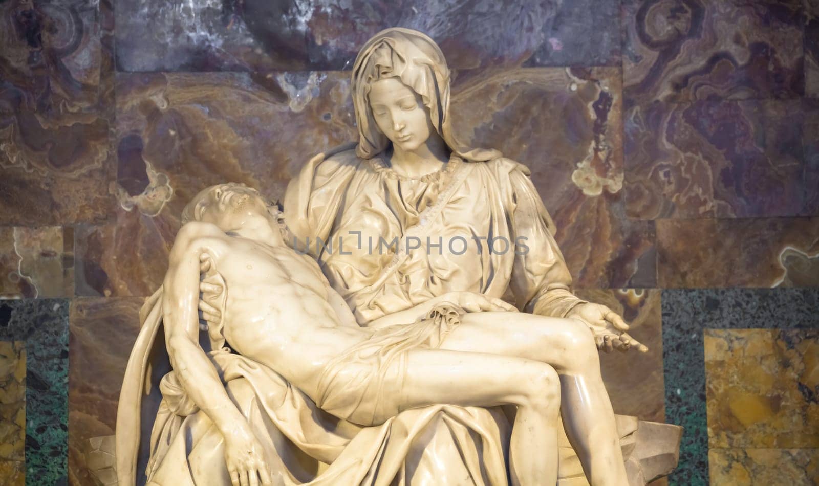 ROME, VATICAN STATE - August 28, 2018: Pietà di Michelangelo (The Pity), 1498-1499, located in St. Peter Basilica in Rome