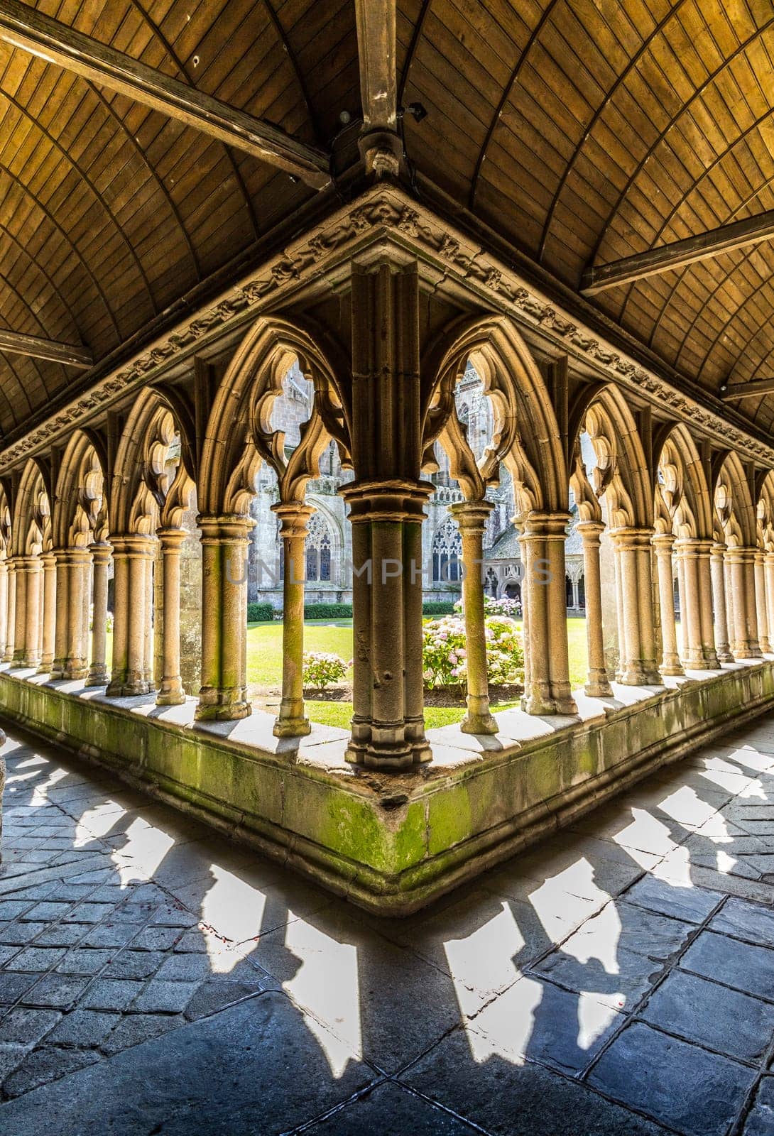 Treguier, Cotes d'Armor, France - August 6th 2017: Saint-Tugdual cathedral, the cloister in flamboyant gothic style from 1461