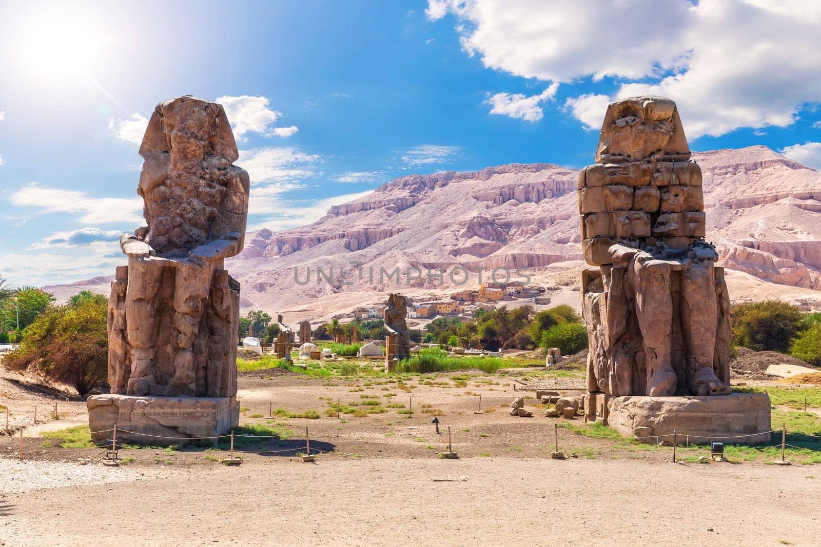 The Colossi of Memnon, famous statues of the Pharaoh Amenhotep, Luxor, Egypt.