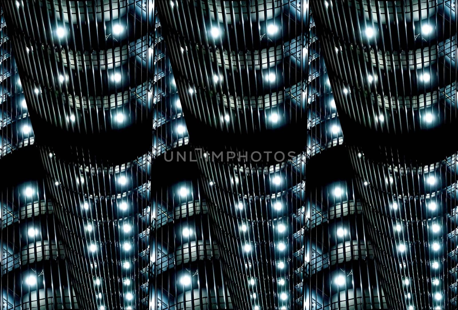 Abstract geometric image of a building night illumination. Night lighting. Office building. UFO. Spaceship. Alien civilization. Background image. Template for text. Business.