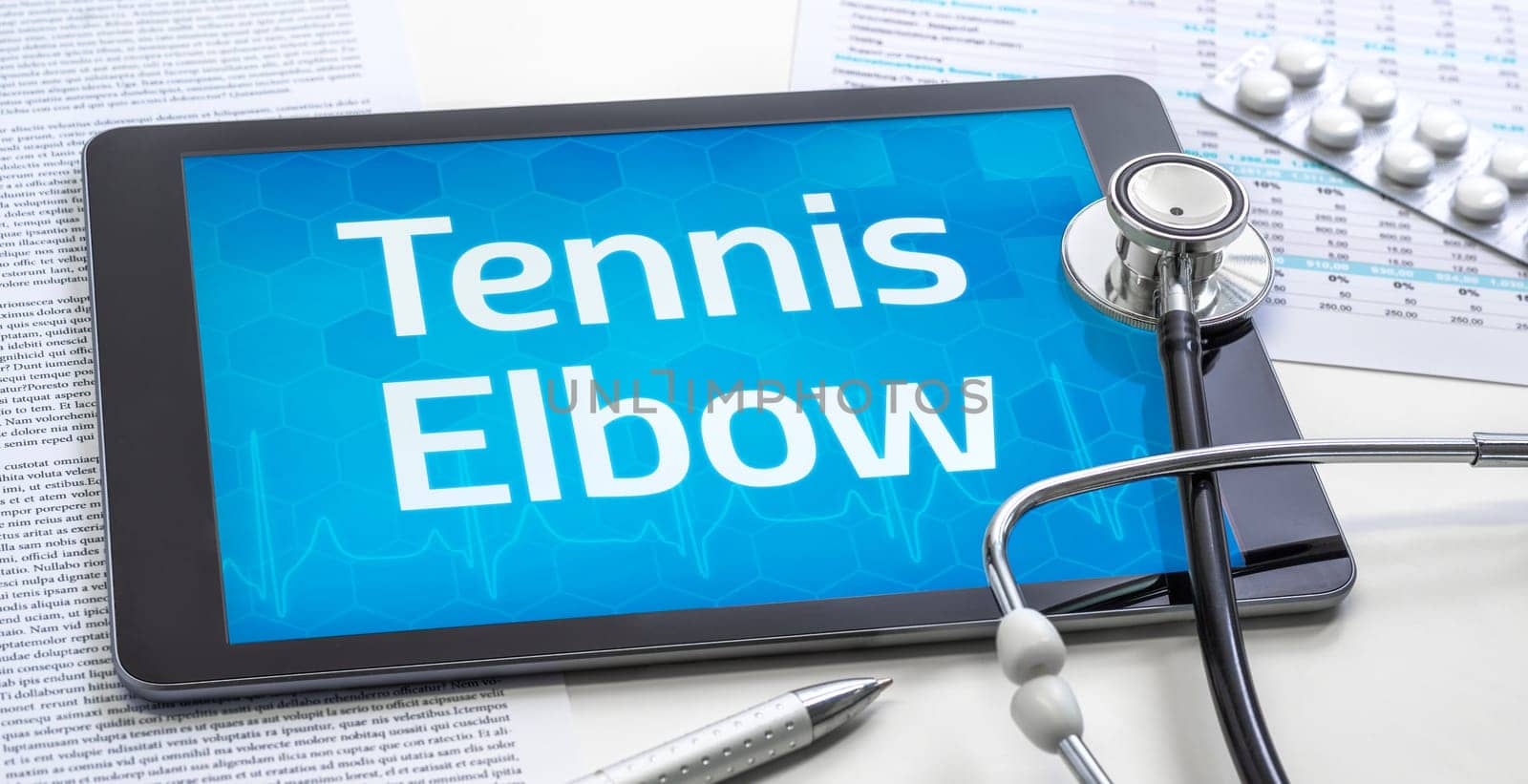 The word Tennis Elbow on the display of a tablet