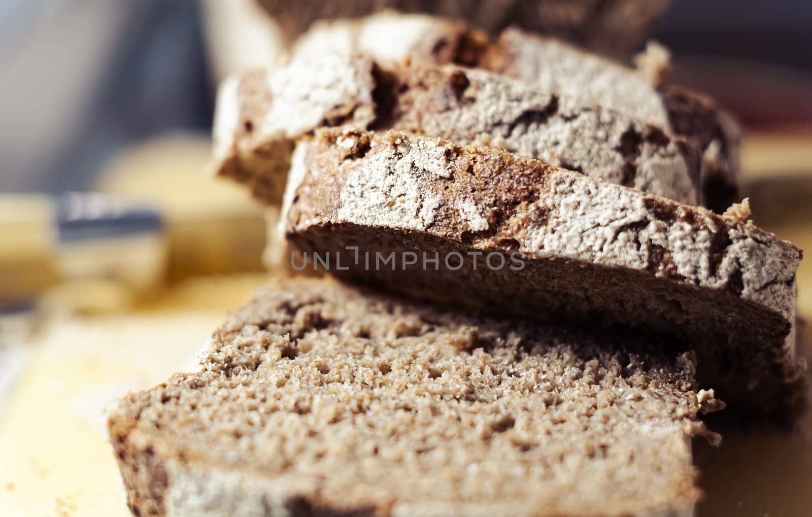 Close-up view of some slices of fresh rye bread. Healthy food and source of fiber. Bakery product