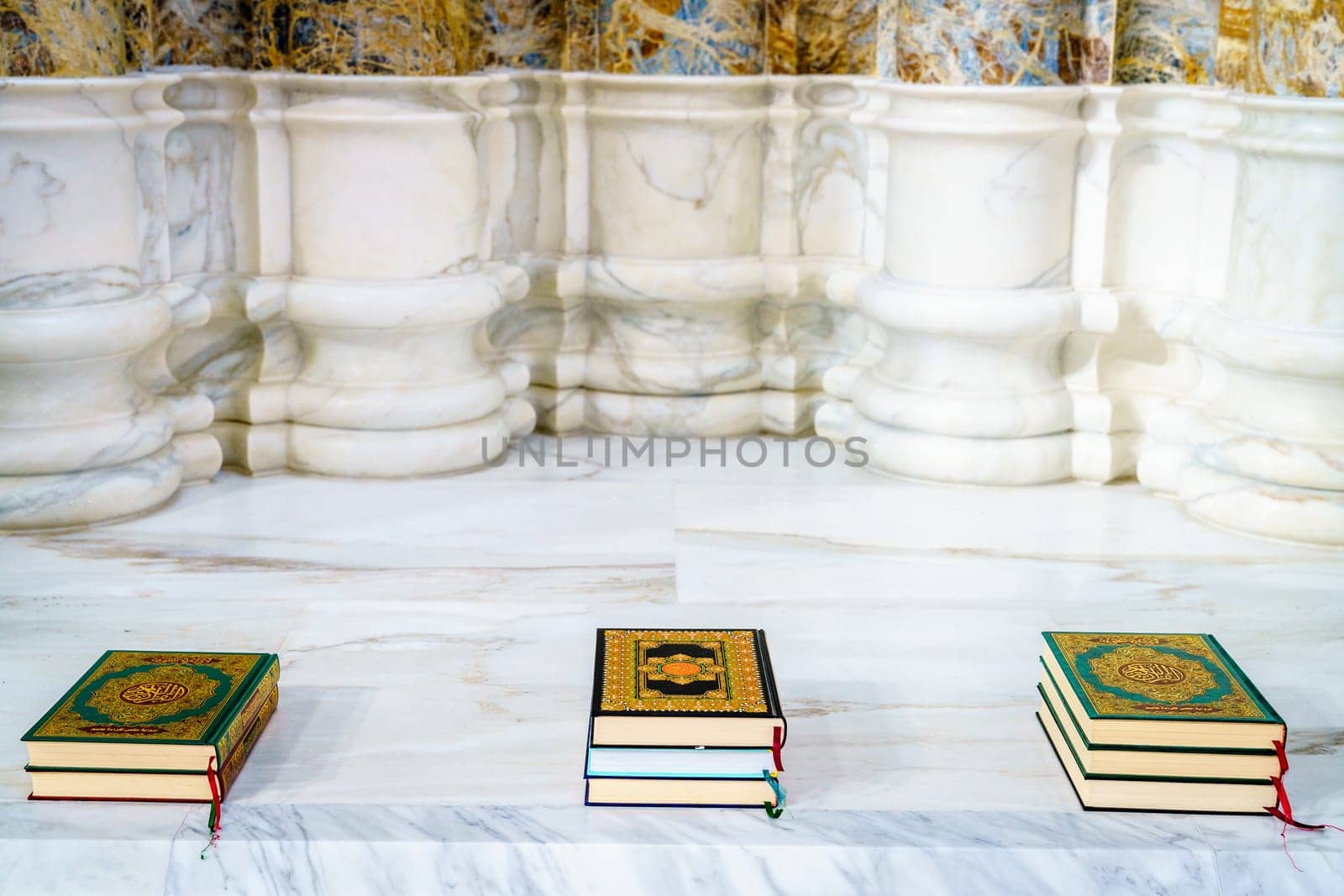 Sacred Quran books in an alcove at a mosque