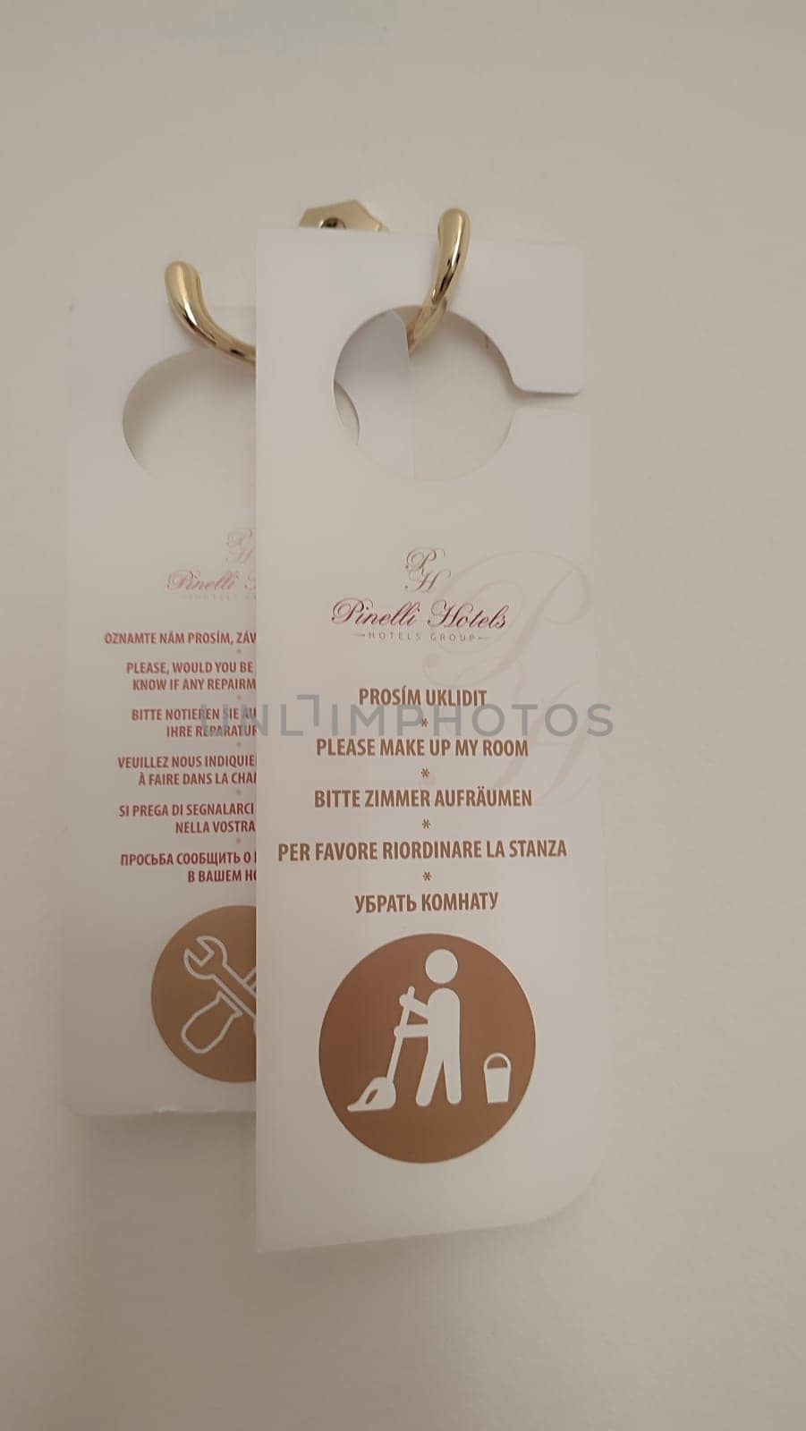 October 15 2024 Prague Czech Republic Europe Room service sign clean room simbol logo door handle bad white paper letter. High quality photo